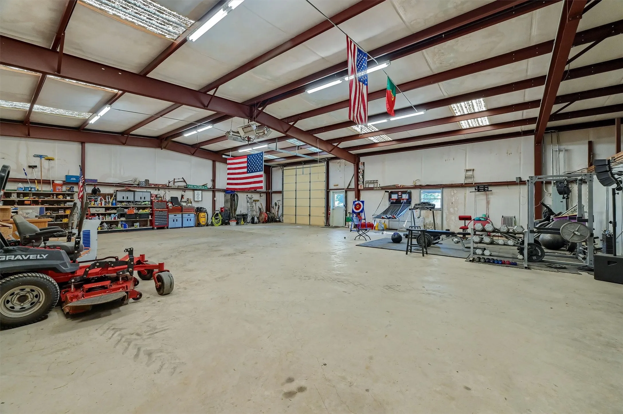 The large shop area can easily accommodate your equipment and provide space for a private gym.