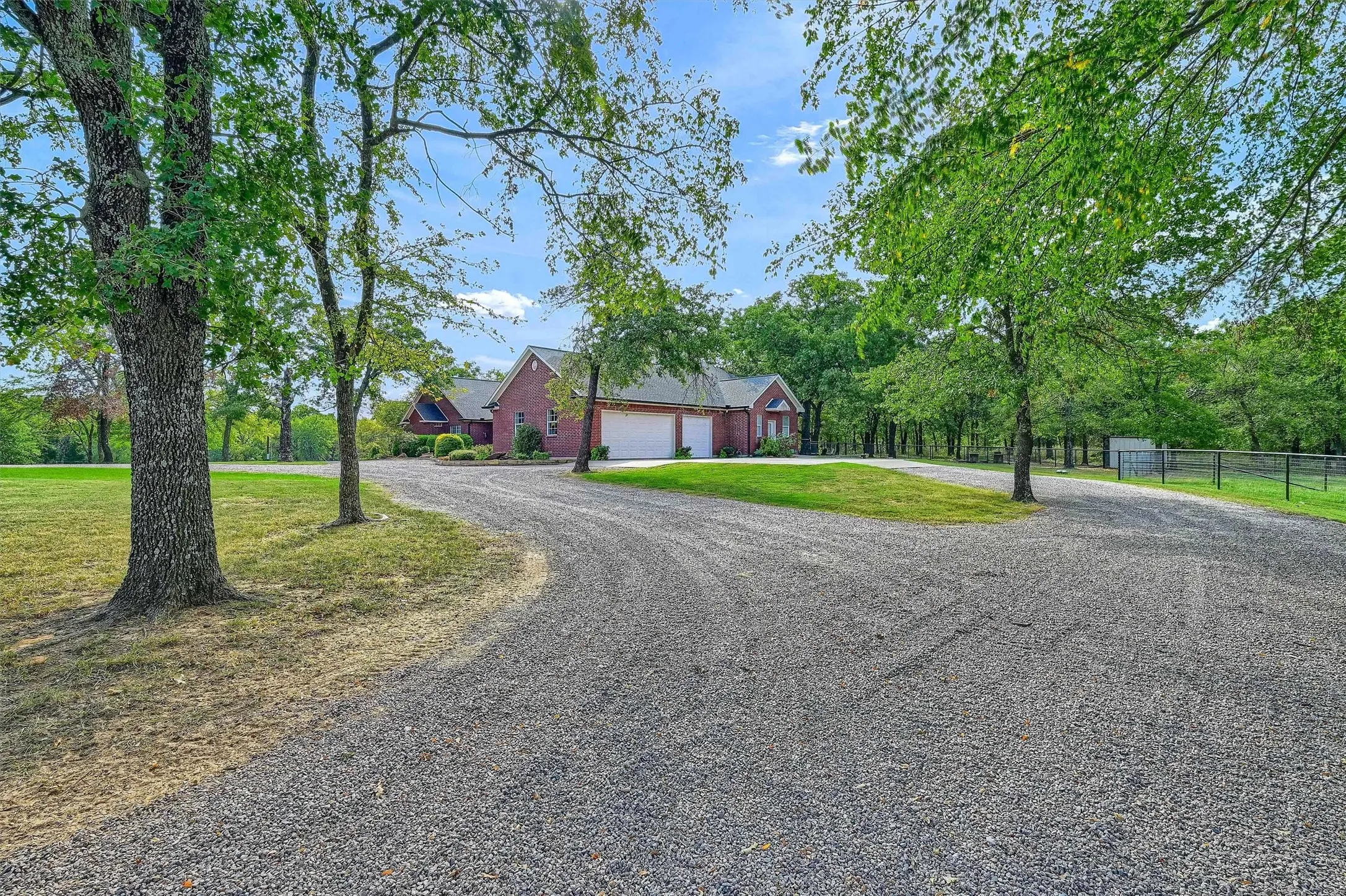 Circular driveway provides plentiful parking when entertaining guests, easy turn-around.