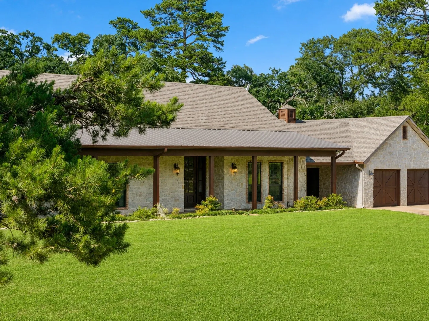 Rocking chairs are the only thing missing from this beautiful front porch scene.