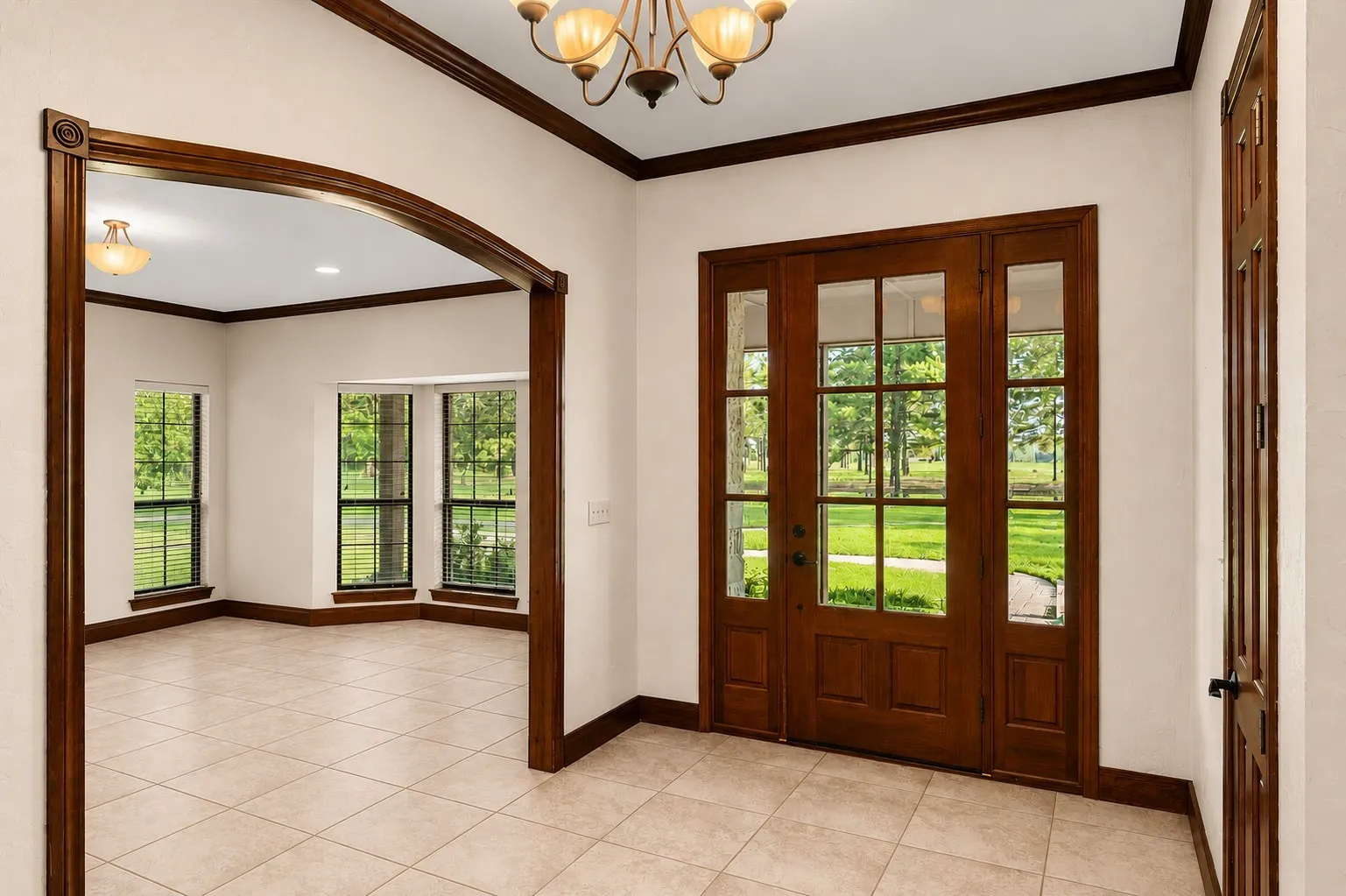 The former piano room's bay window peers into the majestic native trees.  There's lots of room for your favorite furniture as well.