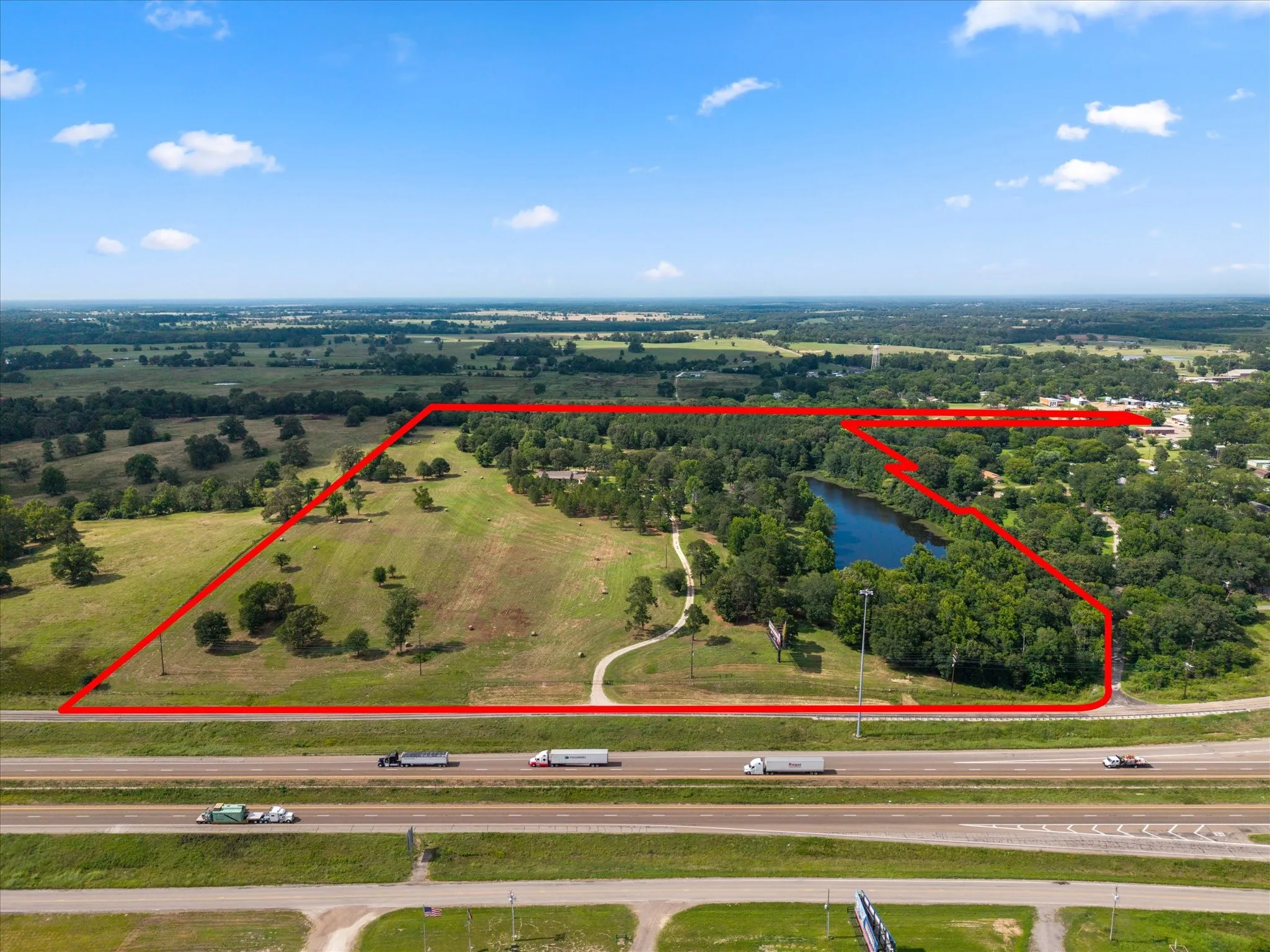 General Outline of 55 Acres +/- Two stocked Ponds  - Easy come, easy go on I-30.