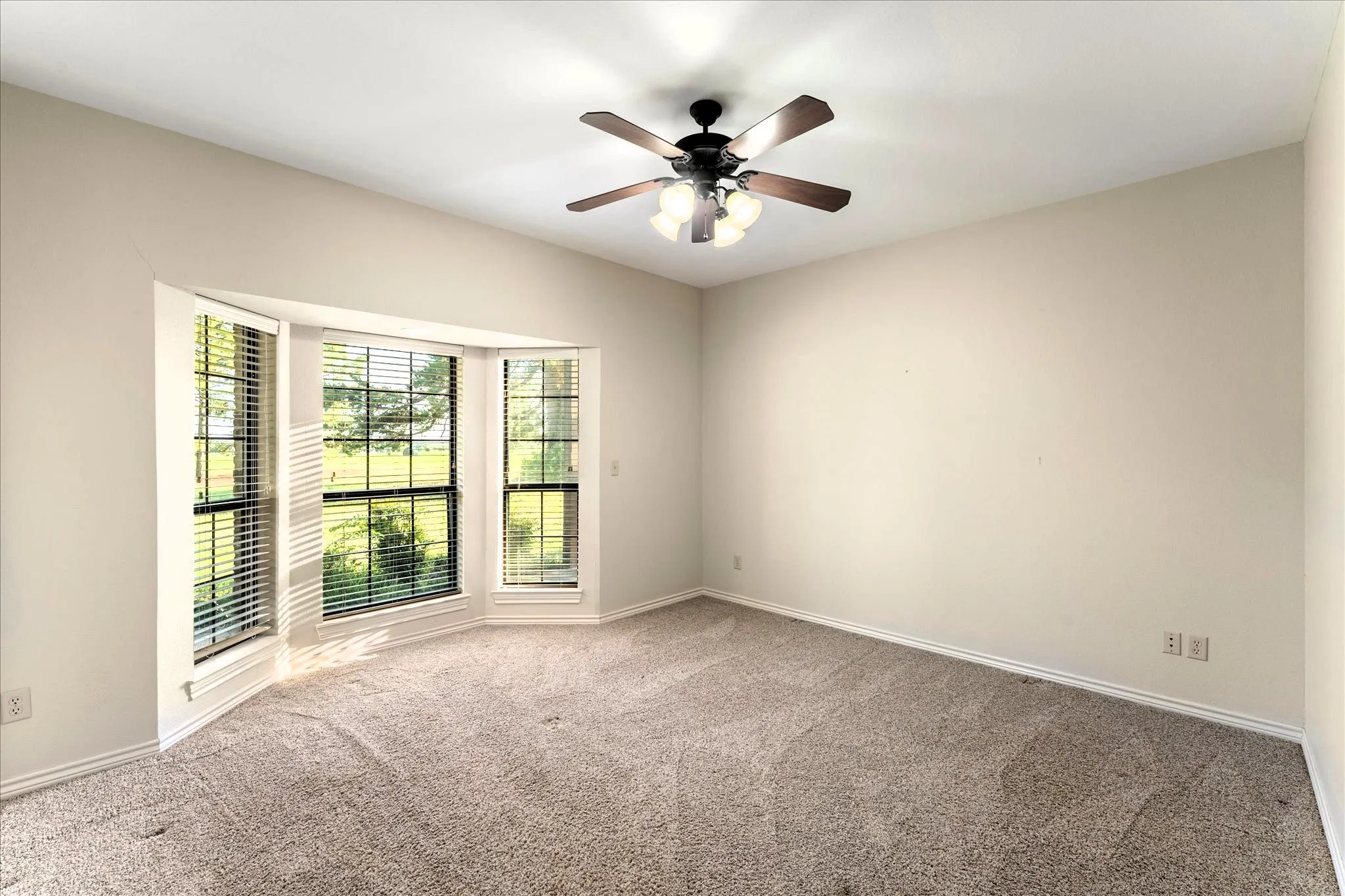 Guest Bedroom with a Bay Window & So Much Comfy Space!