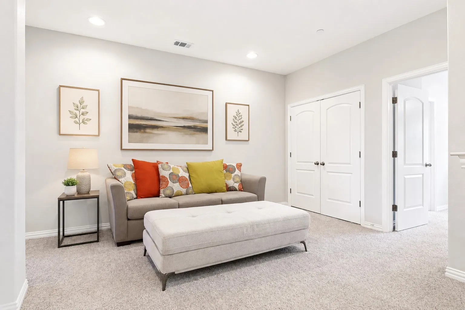 Carpeted room featuring recessed lighting, light-colored walls, white trim, and white paneled doors