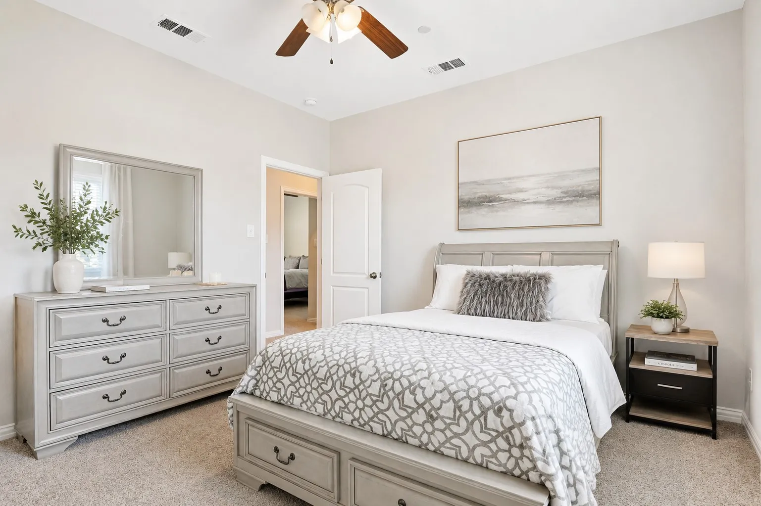 Carpeted room with a ceiling fan, recessed lighting, and a white paneled door