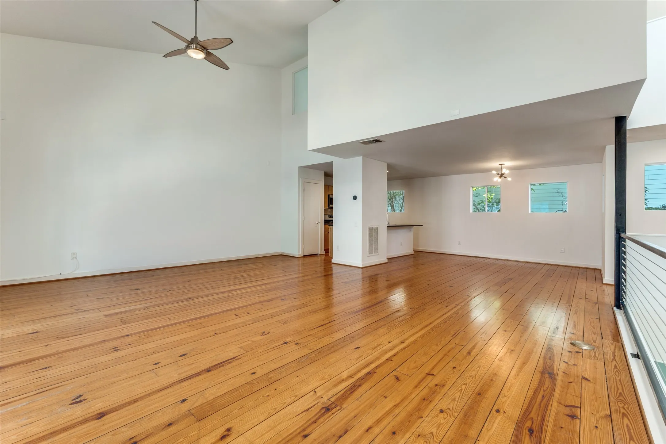 Beautiful pine plank flooring in living areas.