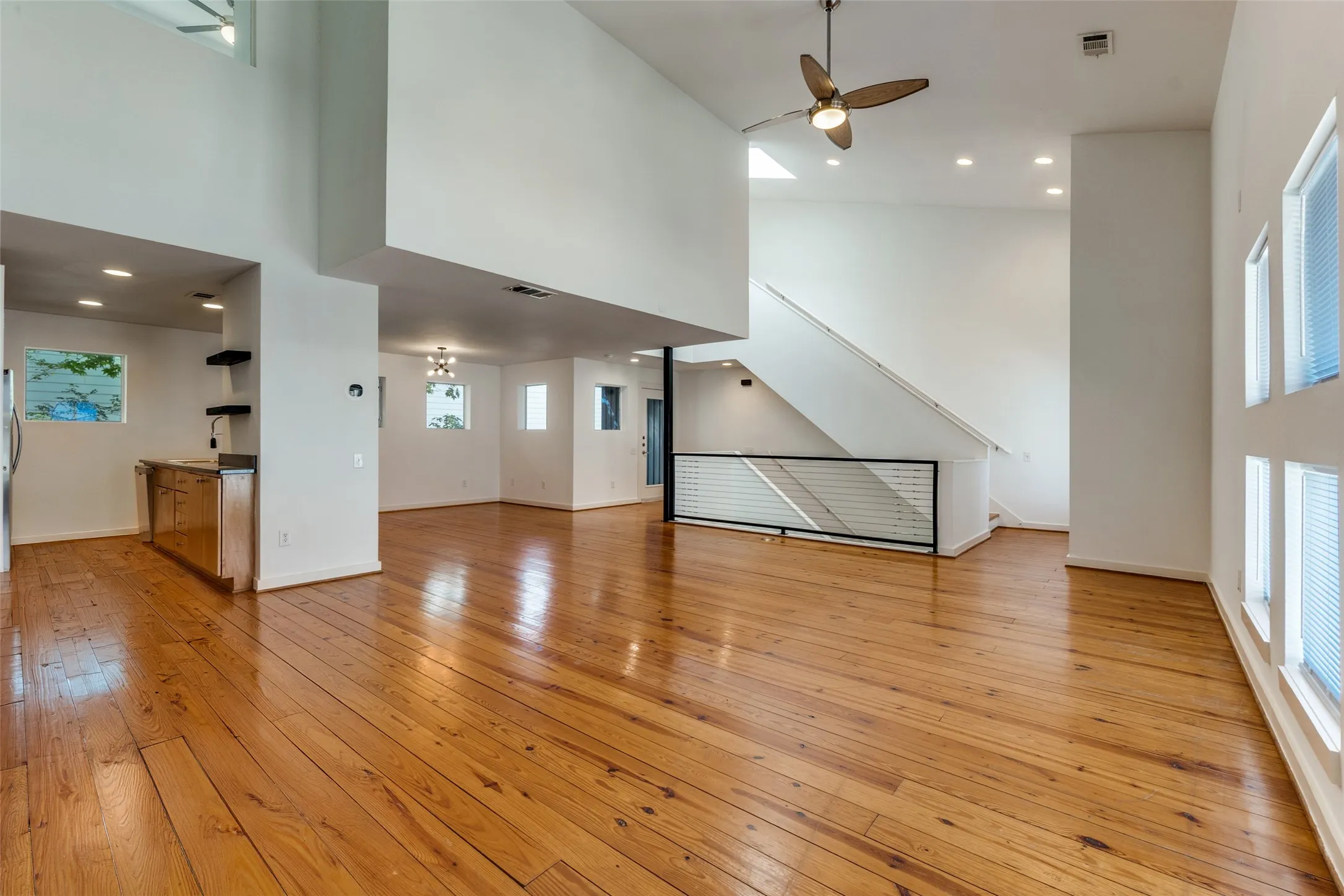 Dramatic open stairway and volume ceilings!