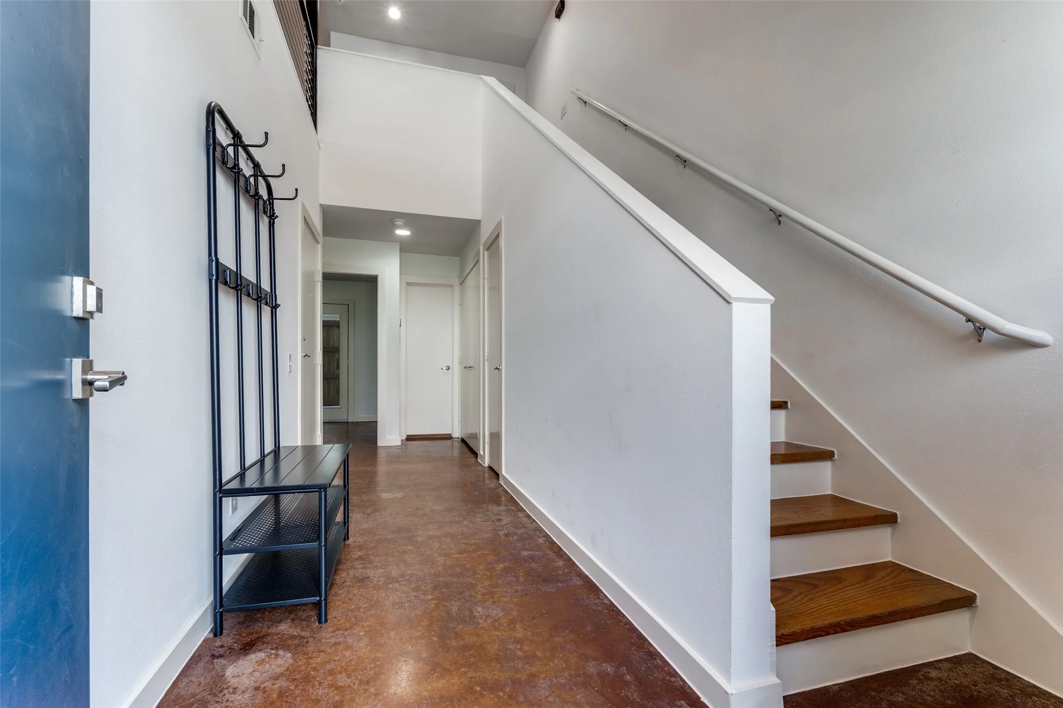 First level entry with inside garage access, guest bedroom and bath, office and laundry.