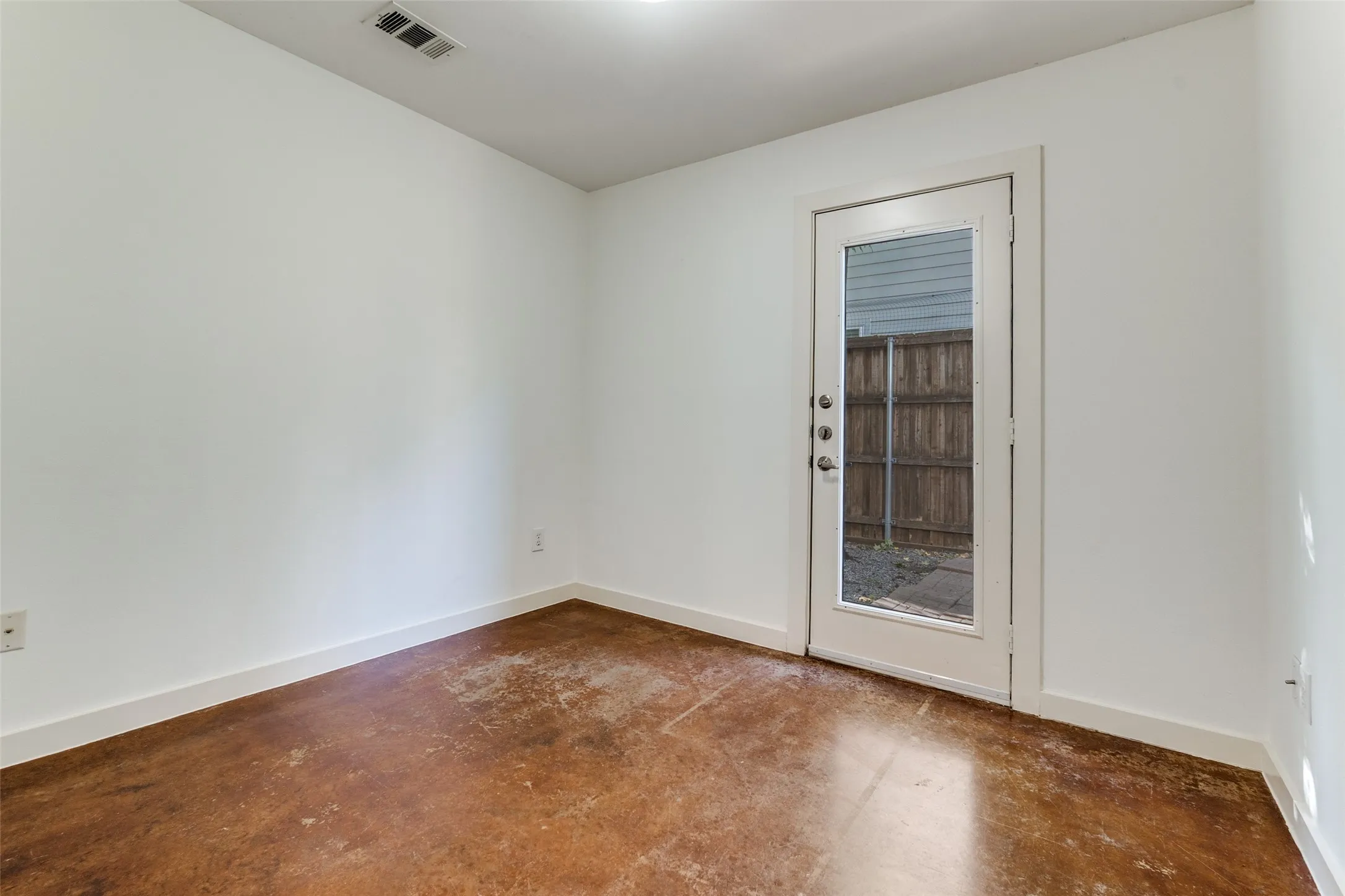 Flex space has access to outdoor patio and courtyard.