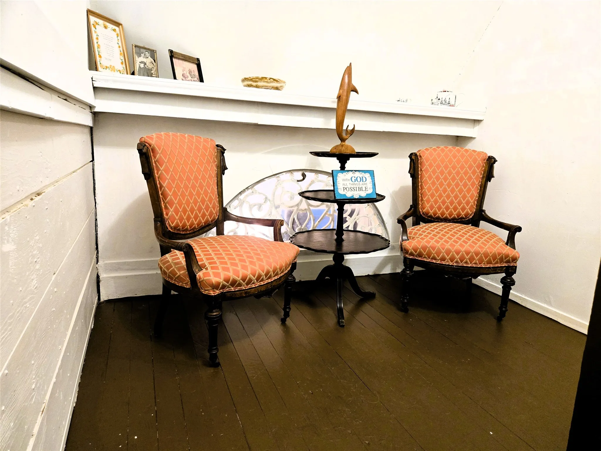 Sitting area on landing of stairs.