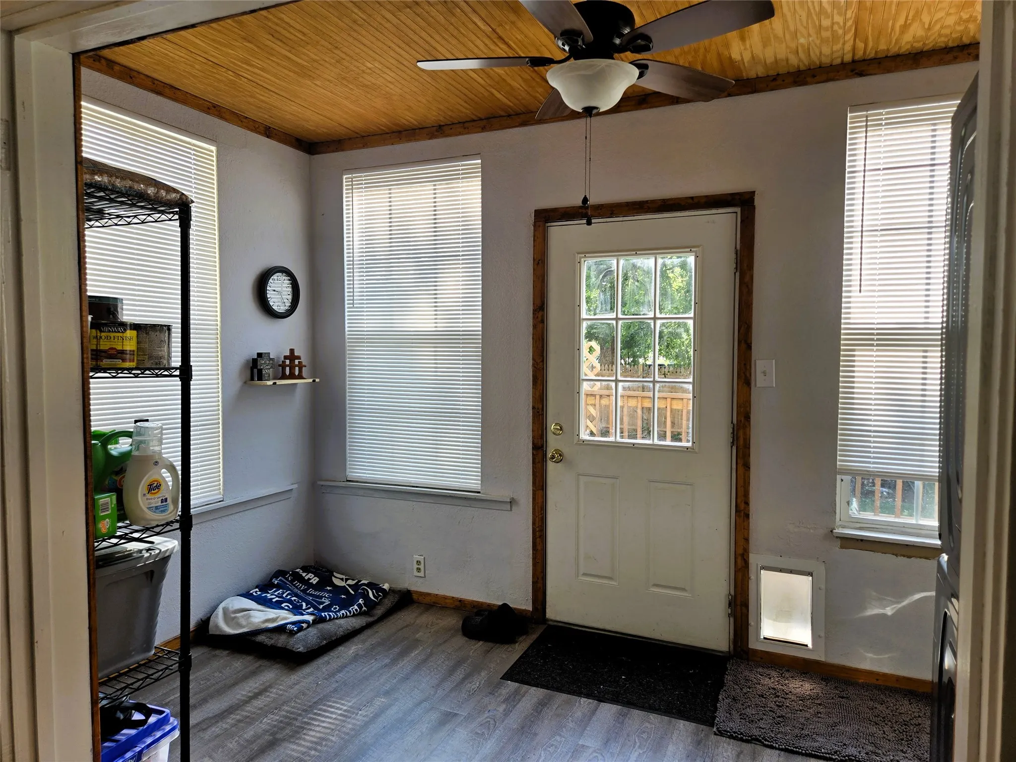 Laundry area with separate pantry area.