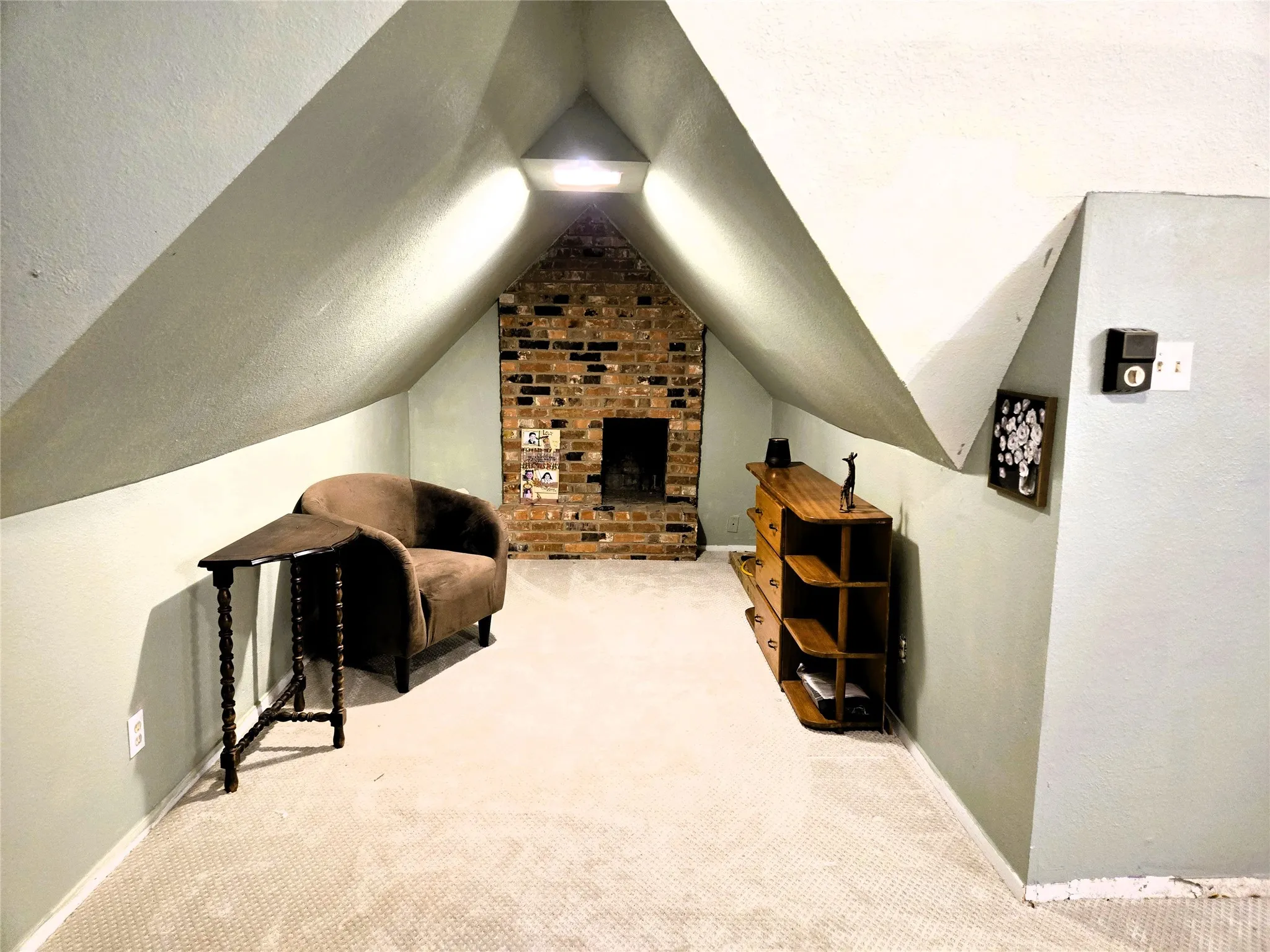 Large size bedroom with fireplace on second level.