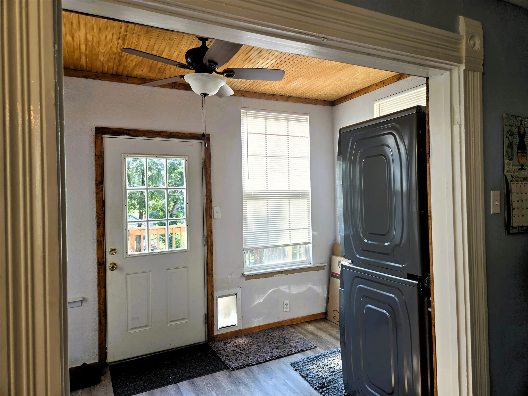 Laundry area with separate pantry area.