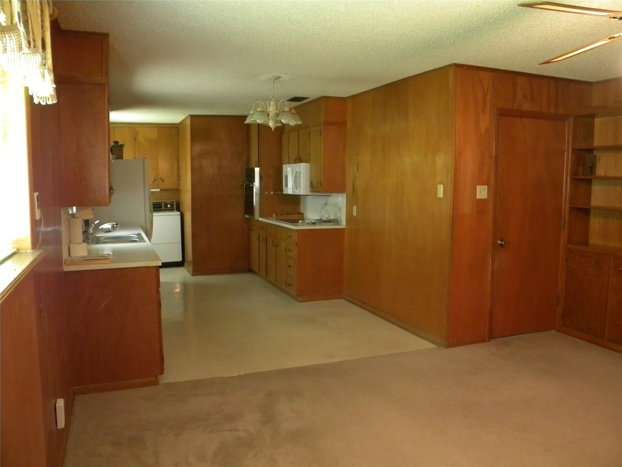 View into Open-Concept Kitchen/Dining area