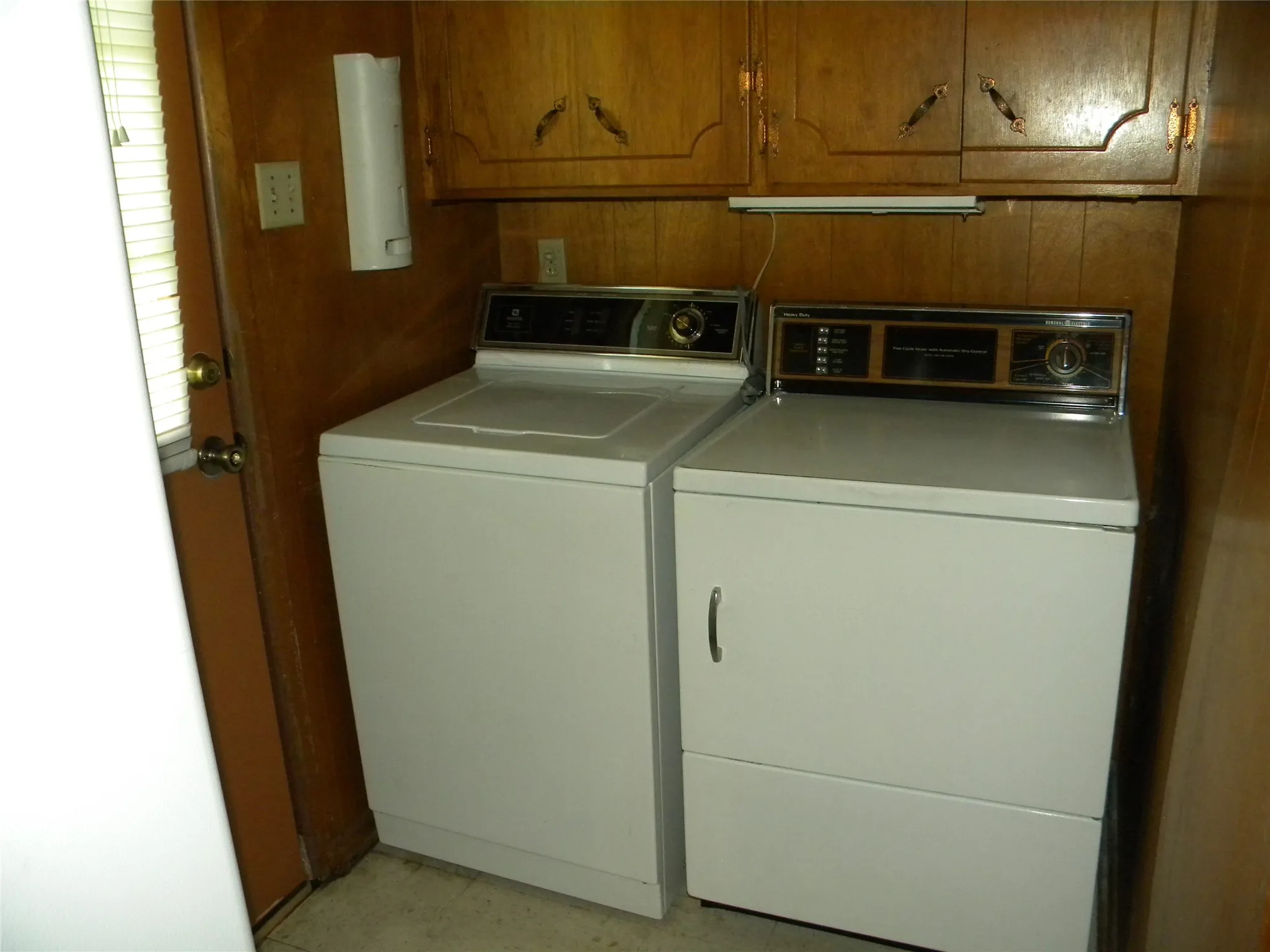 Washer/Dryer with Built-in Storage Cabinets Above