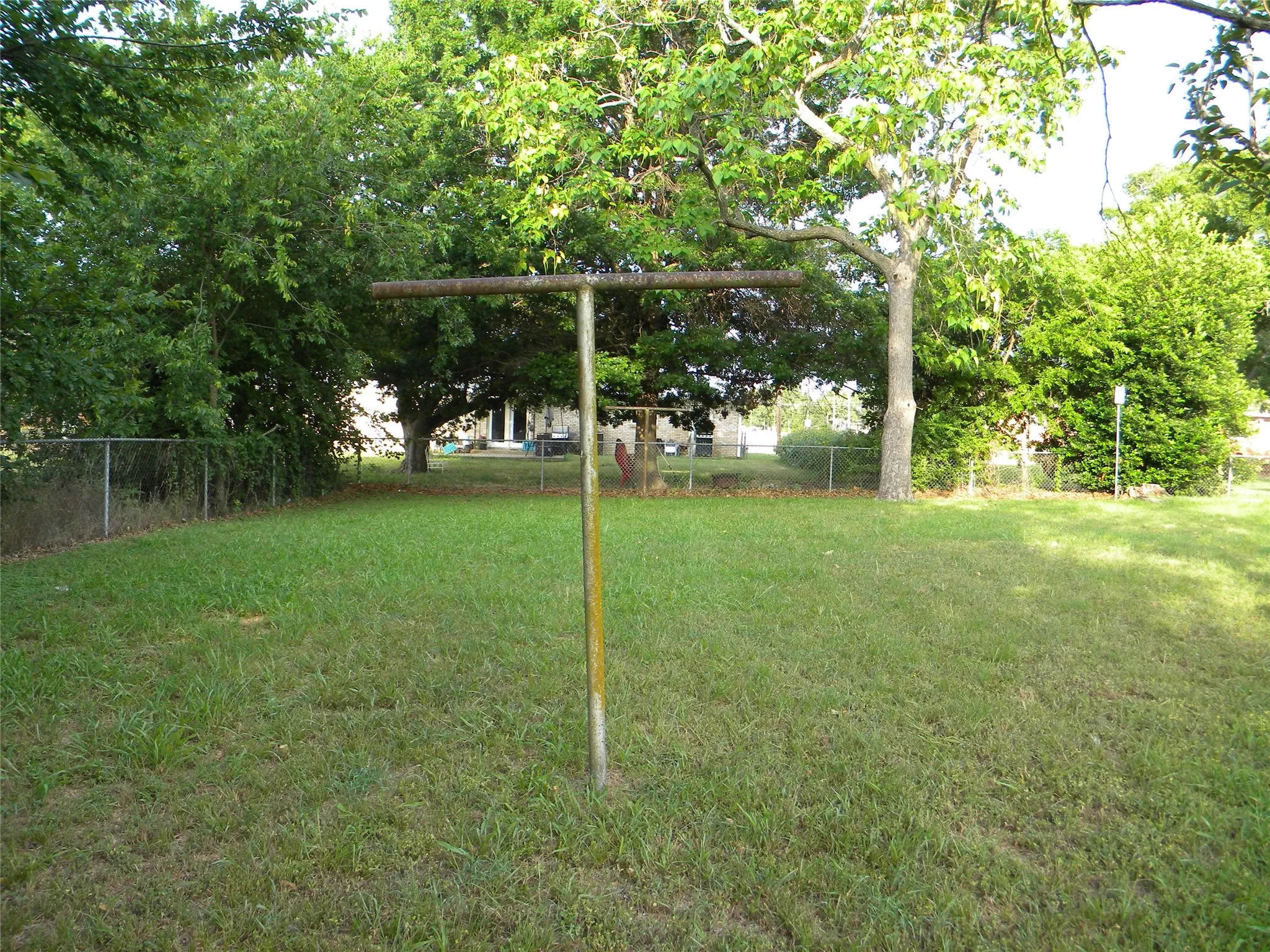 View of Back yard and Clothes Line Posts