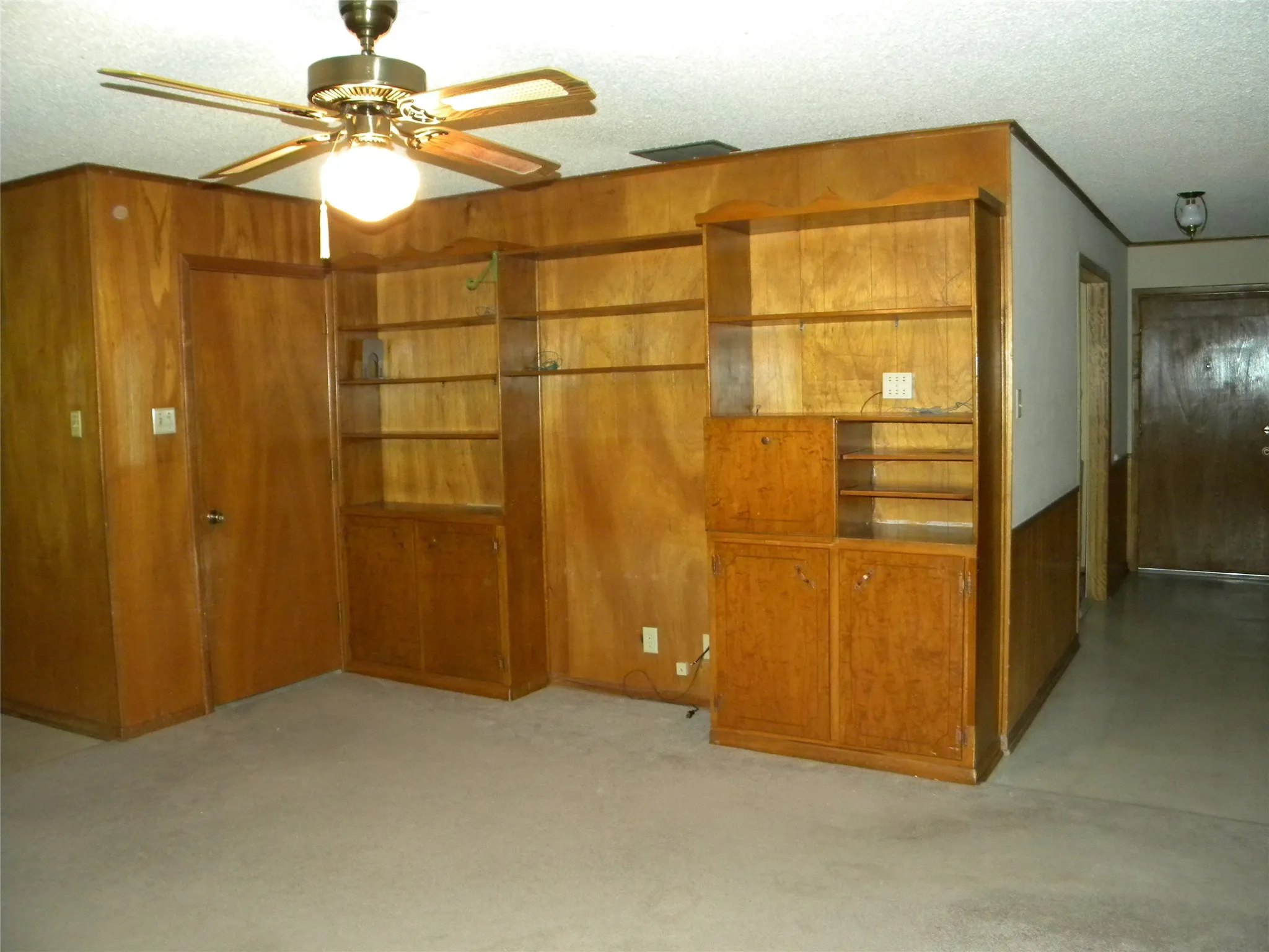Built-In Shelving and view of Entry Hall