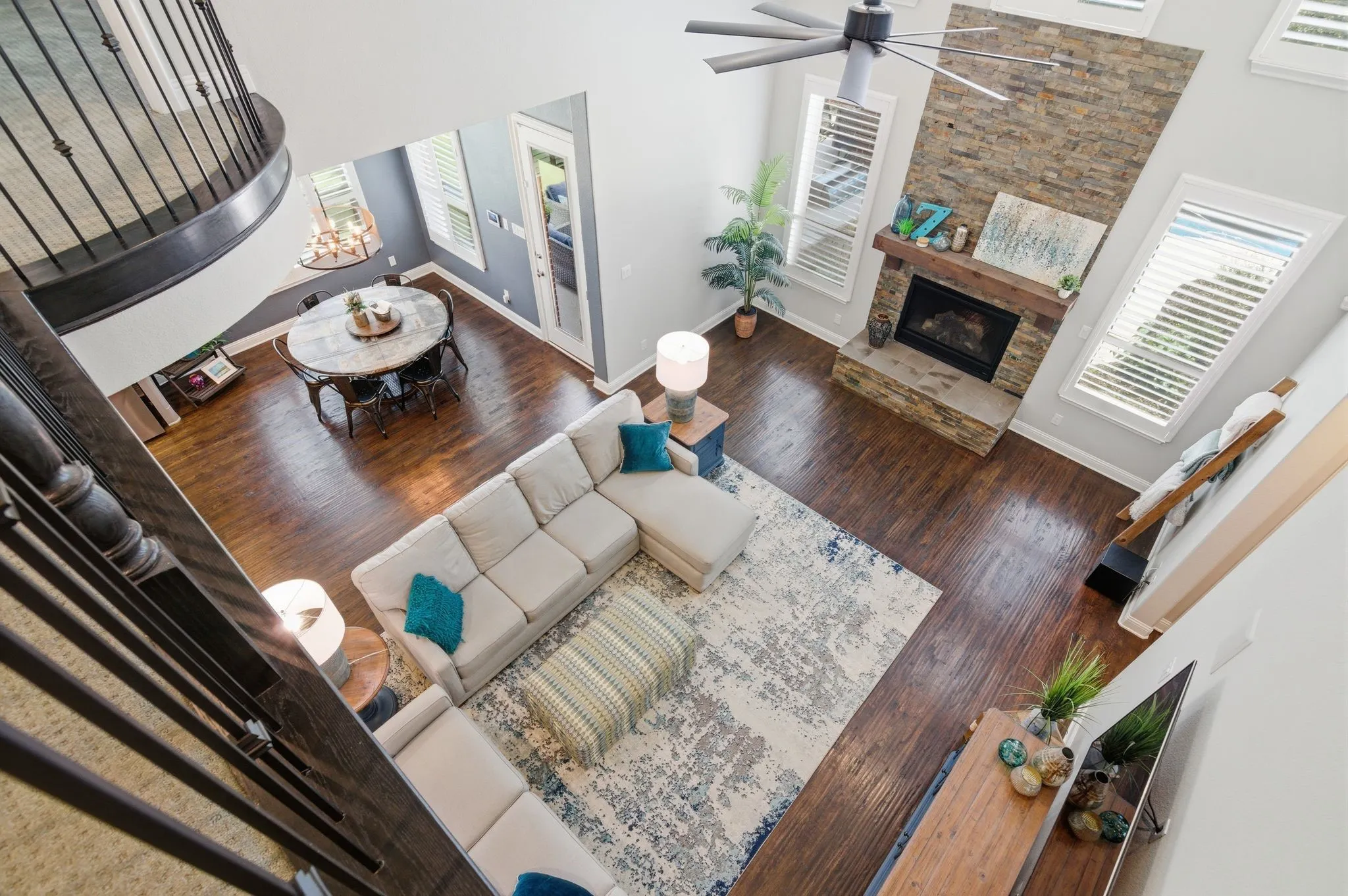 Open-concept living space with dark wood-finish flooring