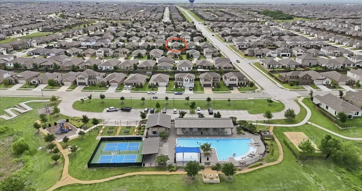 Community amenities featuring a swimming pool, tennis courts, and recreational green spaces