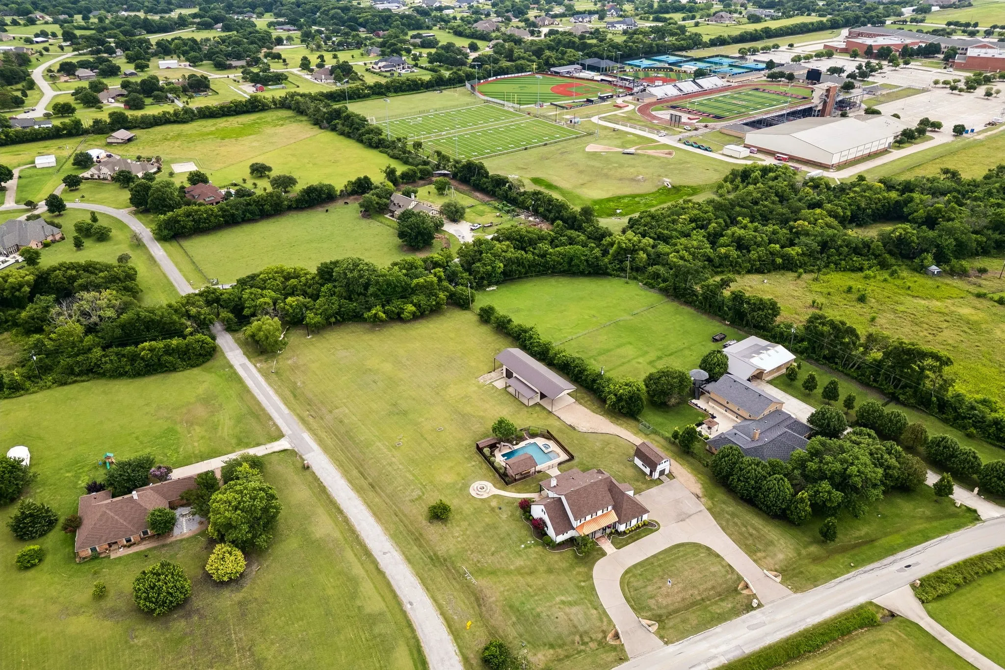 With Lovejoy High School in the background, enjoy one of the best locations. All homes in the neighborhood sit on a minimum of 2 acres, so there's lots of elbow room. Don't miss the treehouse in the wooded area at the back of the property.