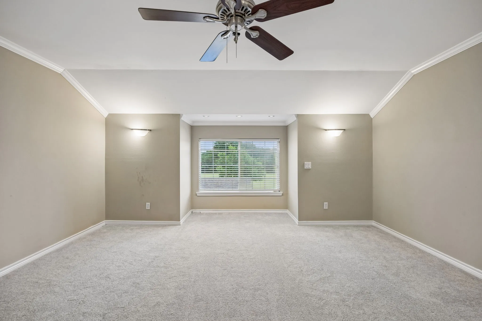 Flex room in the middle of the upstairs. Could be play room or media room.