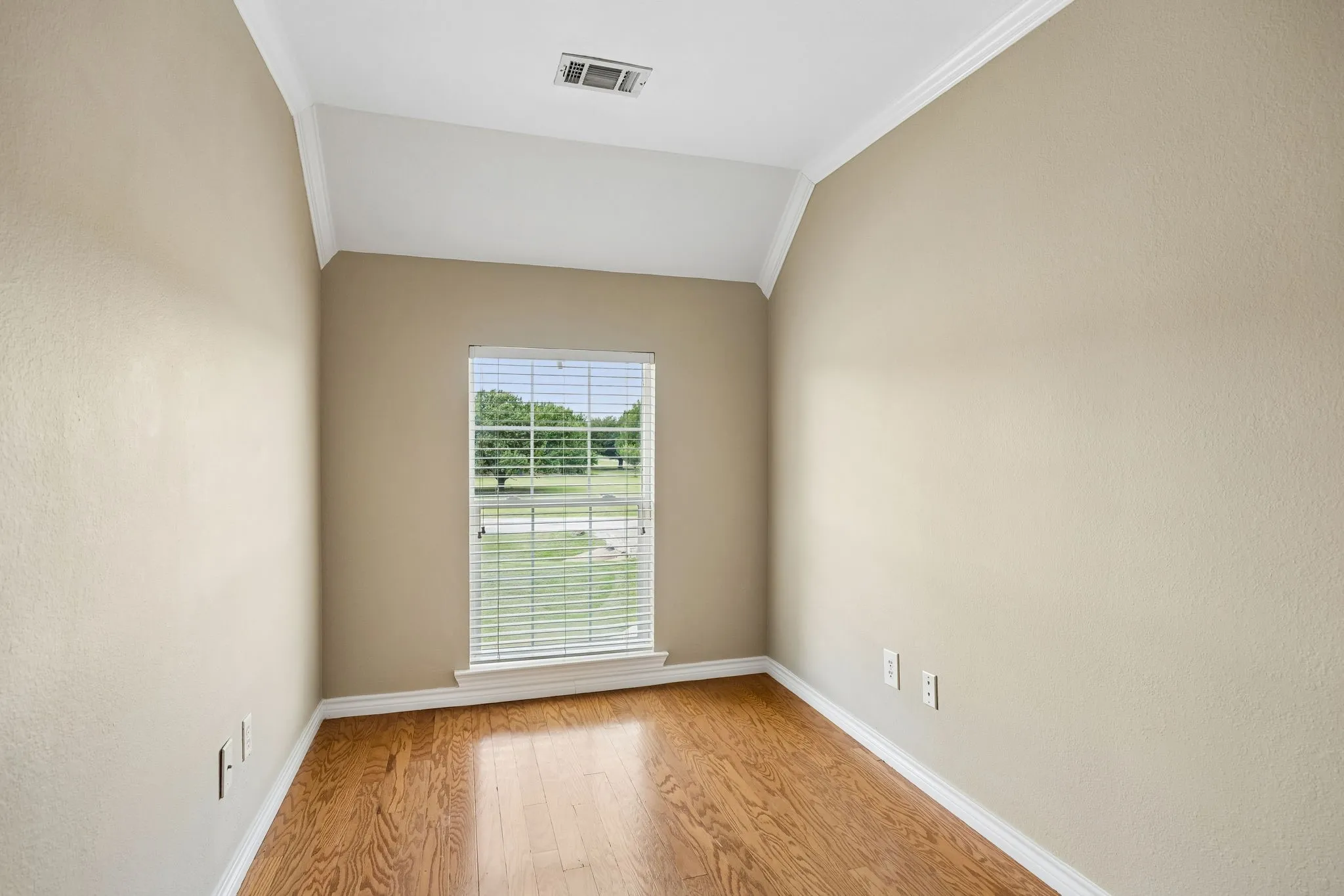 Step up into this cute space... would be an ideal reading or study space!
