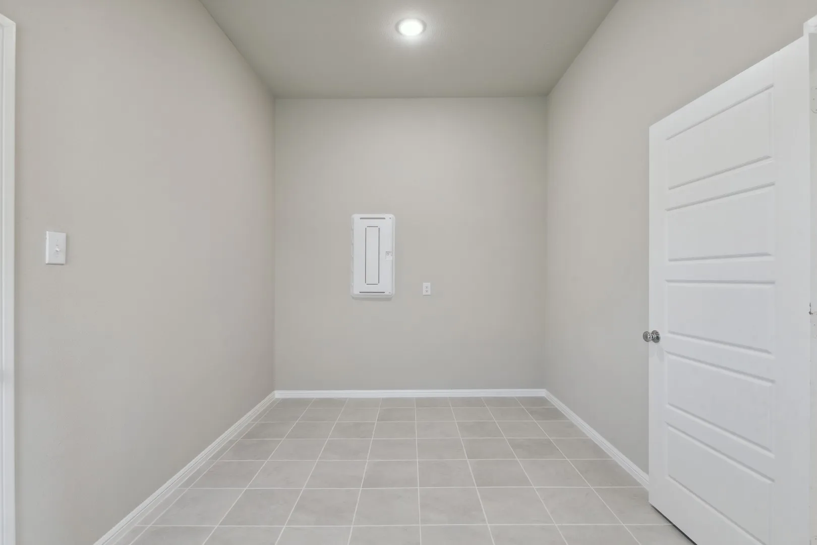 Utility Room in the Diamond home plan by Trophy Signature Homes – REPRESENTATIVE PHOTO