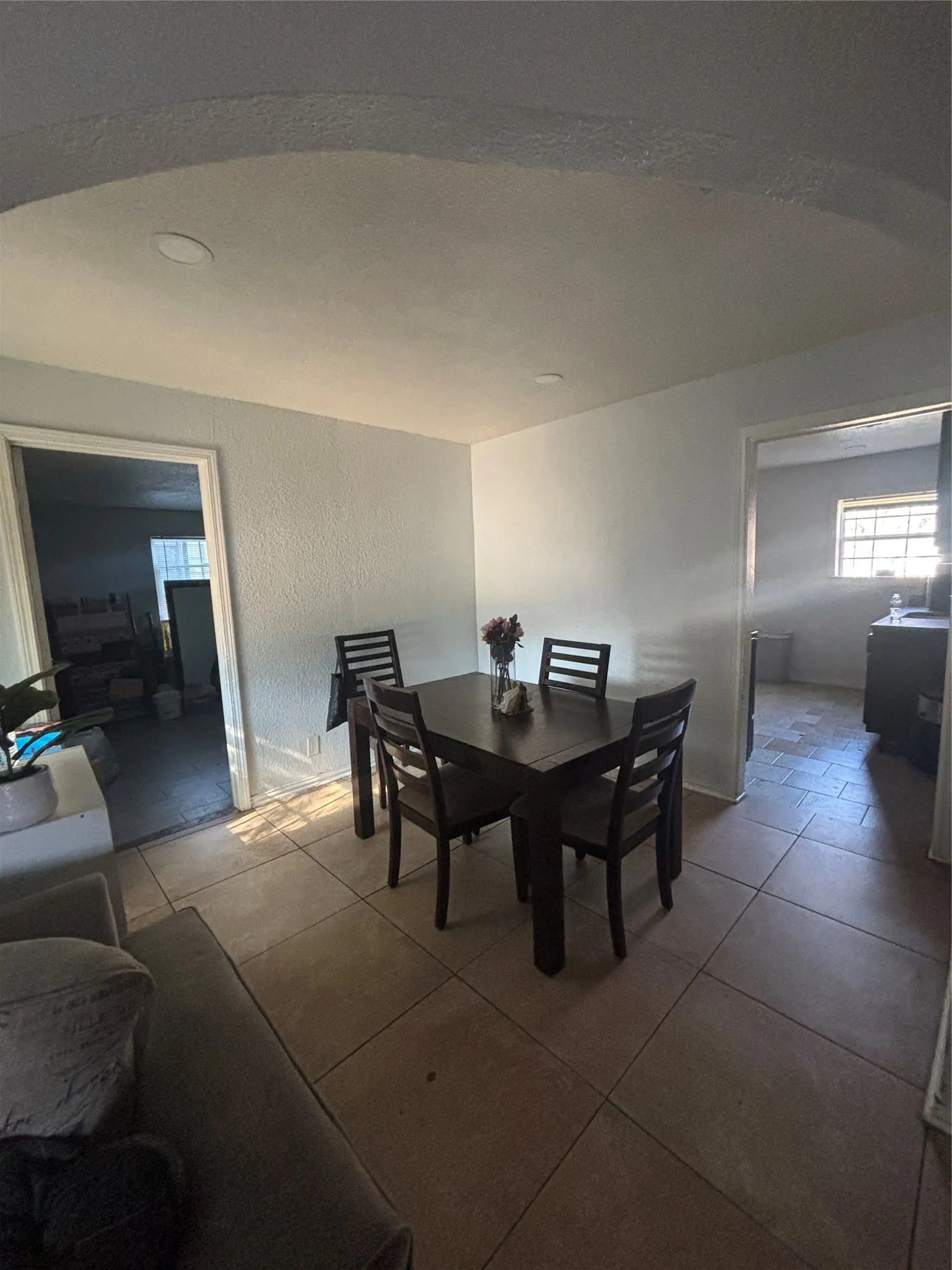 Dining area featuring tiled flooring and recessed lighting