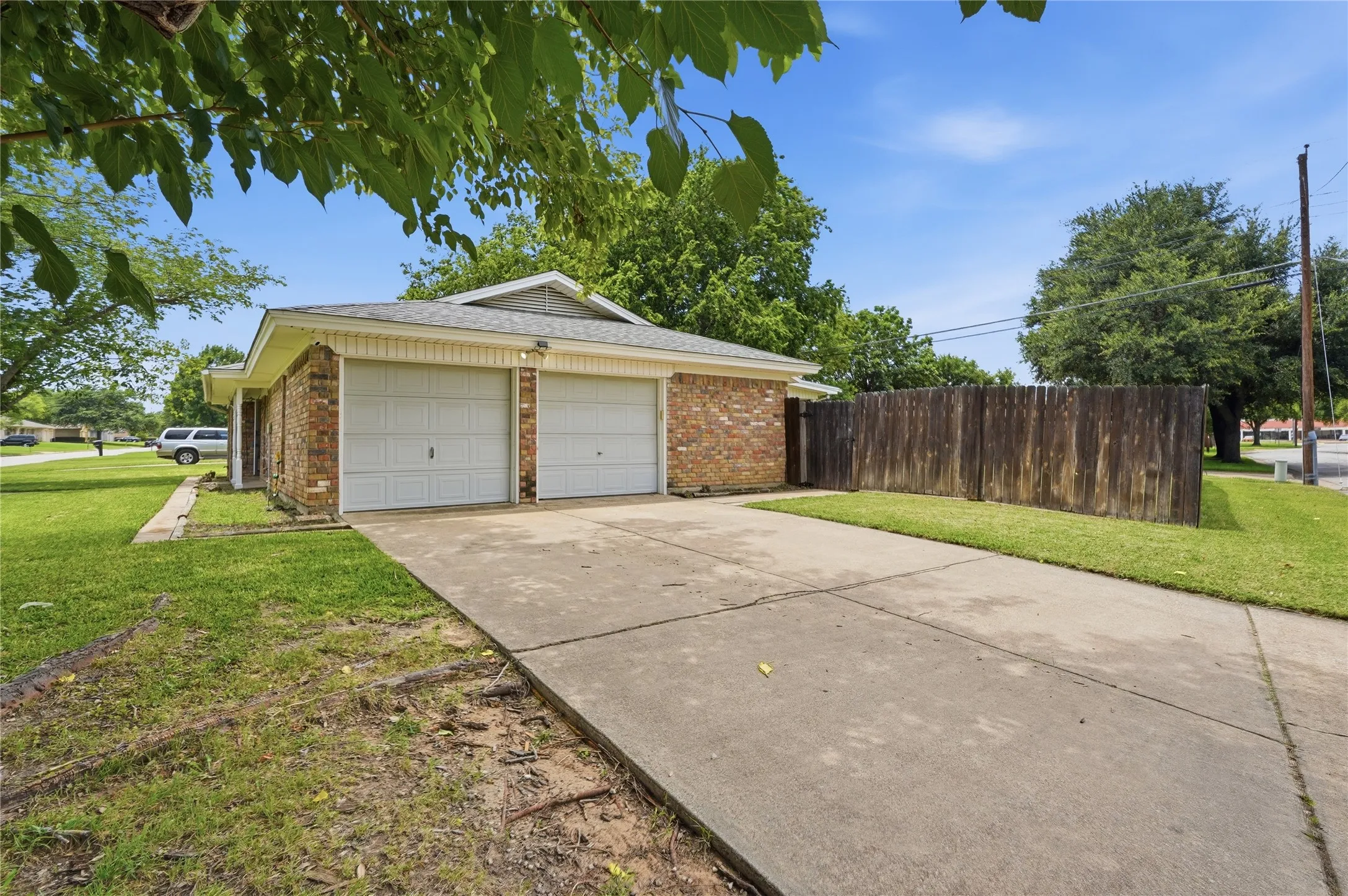Brick exterior with a two-car garage