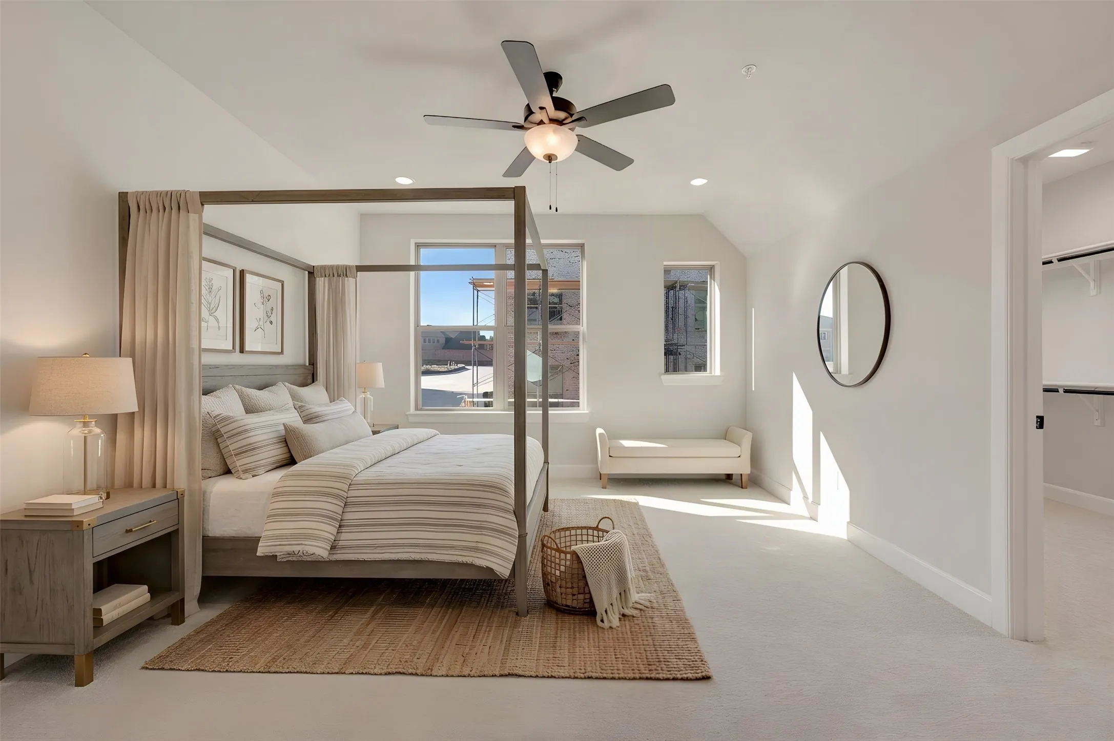 Vaulted ceiling with recessed lighting and ceiling fan