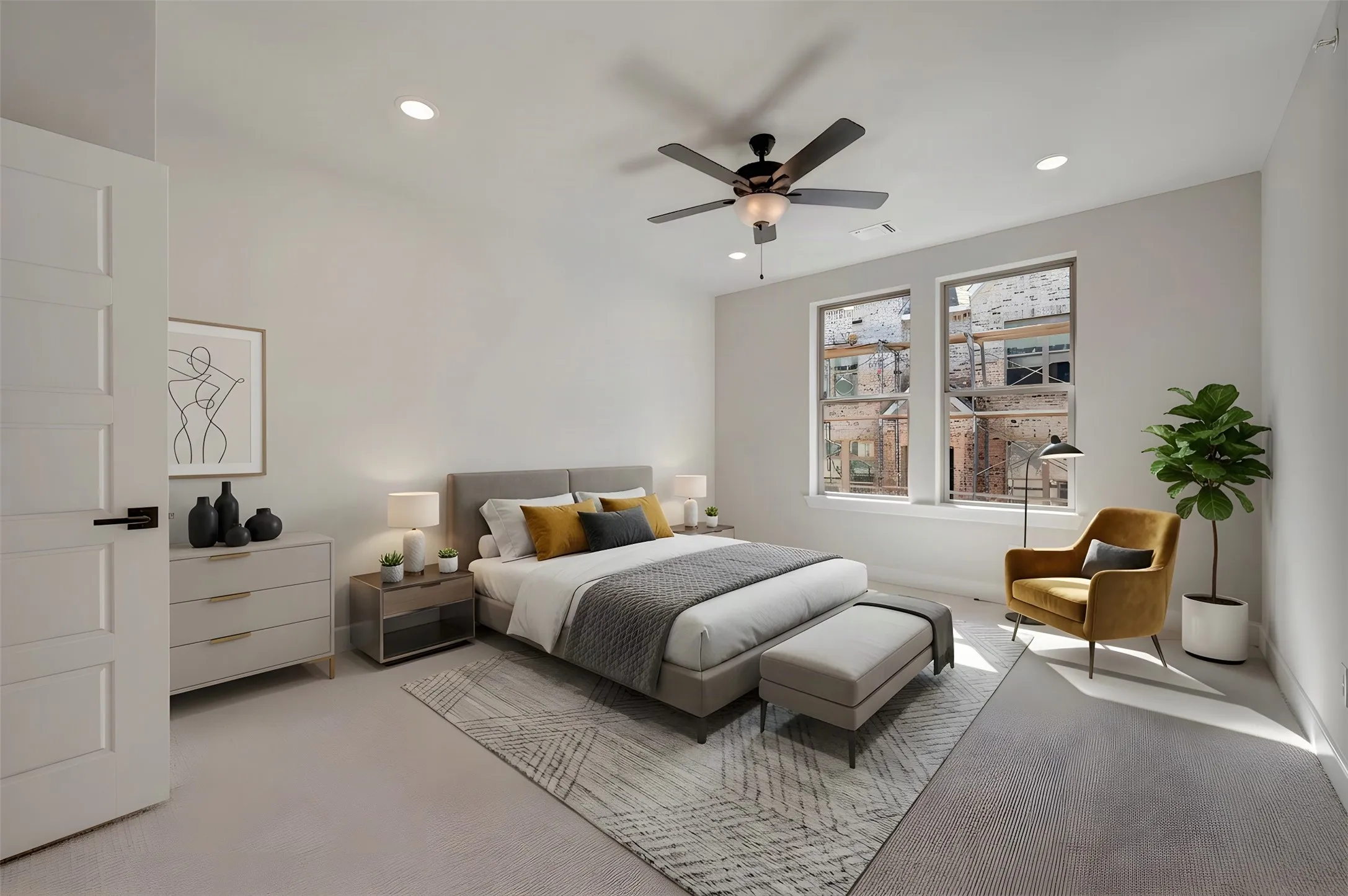Recessed ceiling lighting, ceiling fan with integrated light, two large windows, white paneled door with black hardware, and light-colored wall-to-wall carpeting