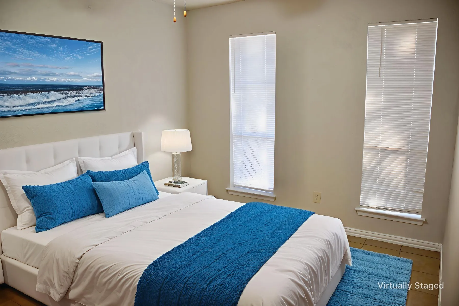 Bedroom featuring two vertical windows with blinds, a ceiling fan with integrated lighting, and wood-finish flooring