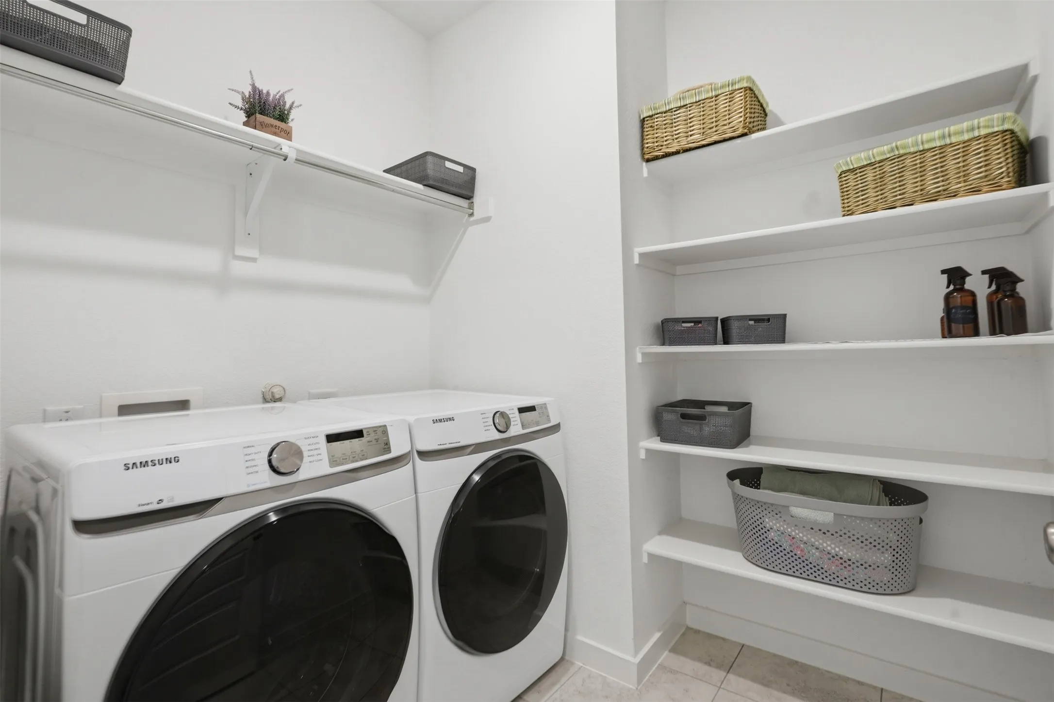 Laundry day is easier with a spacious utility room and built-in storage.