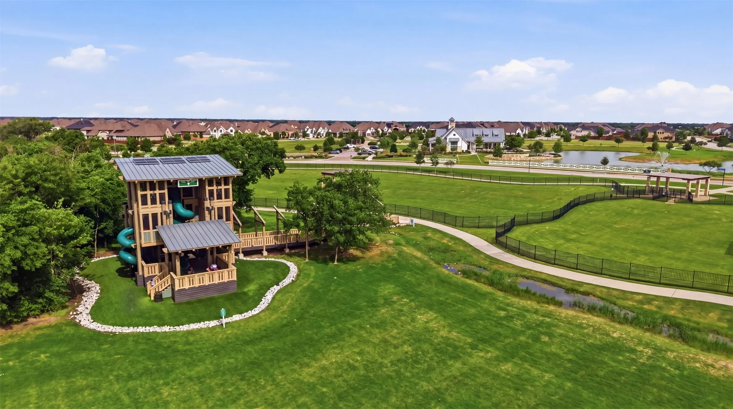 Family fun starts with amazing neighborhood amenities like this. Explore, climb, slide, and play in this incredible community park.