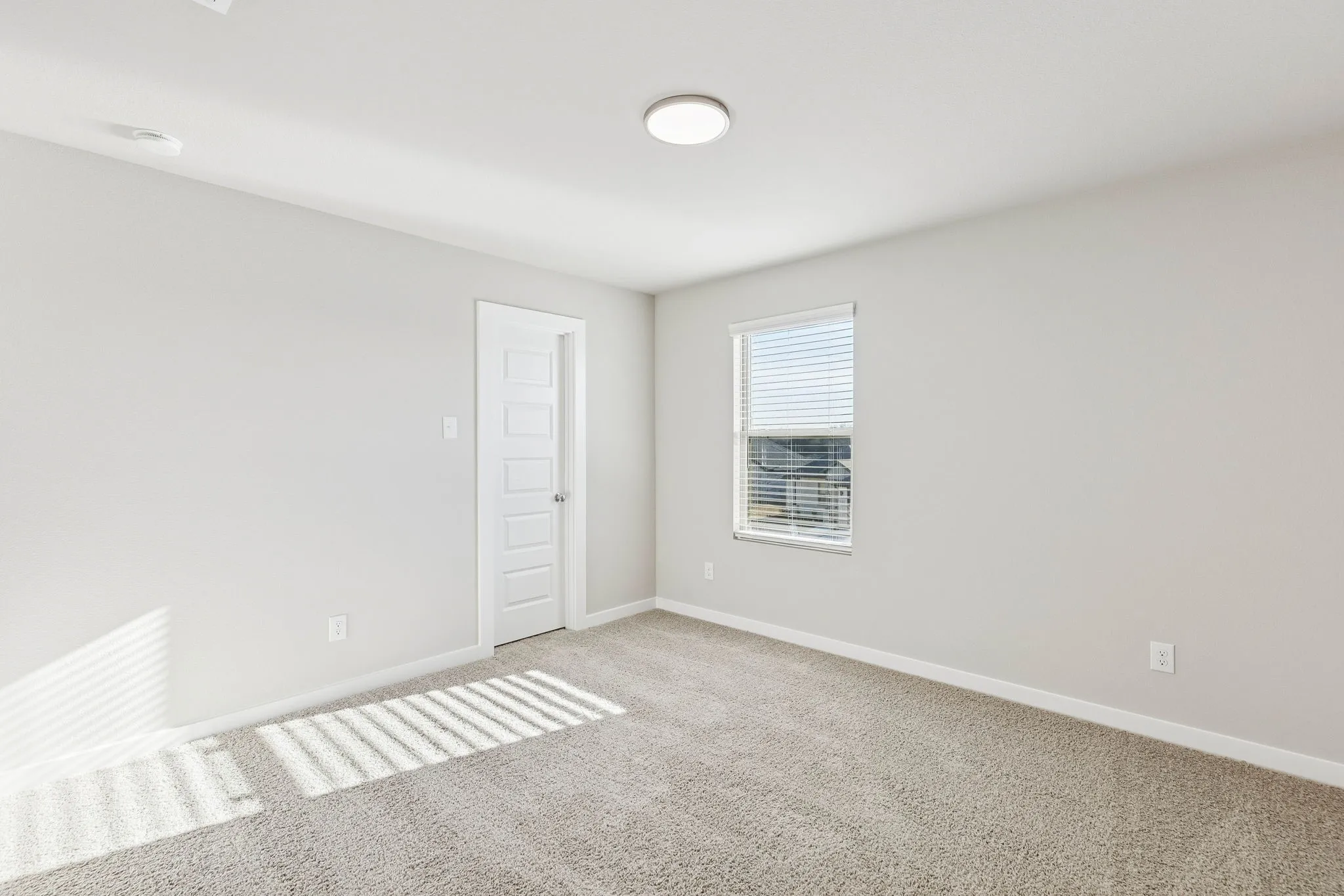 Bedroom in the Haylee home plan by Trophy Signature Homes - REPRESENTATIVE PHOTO