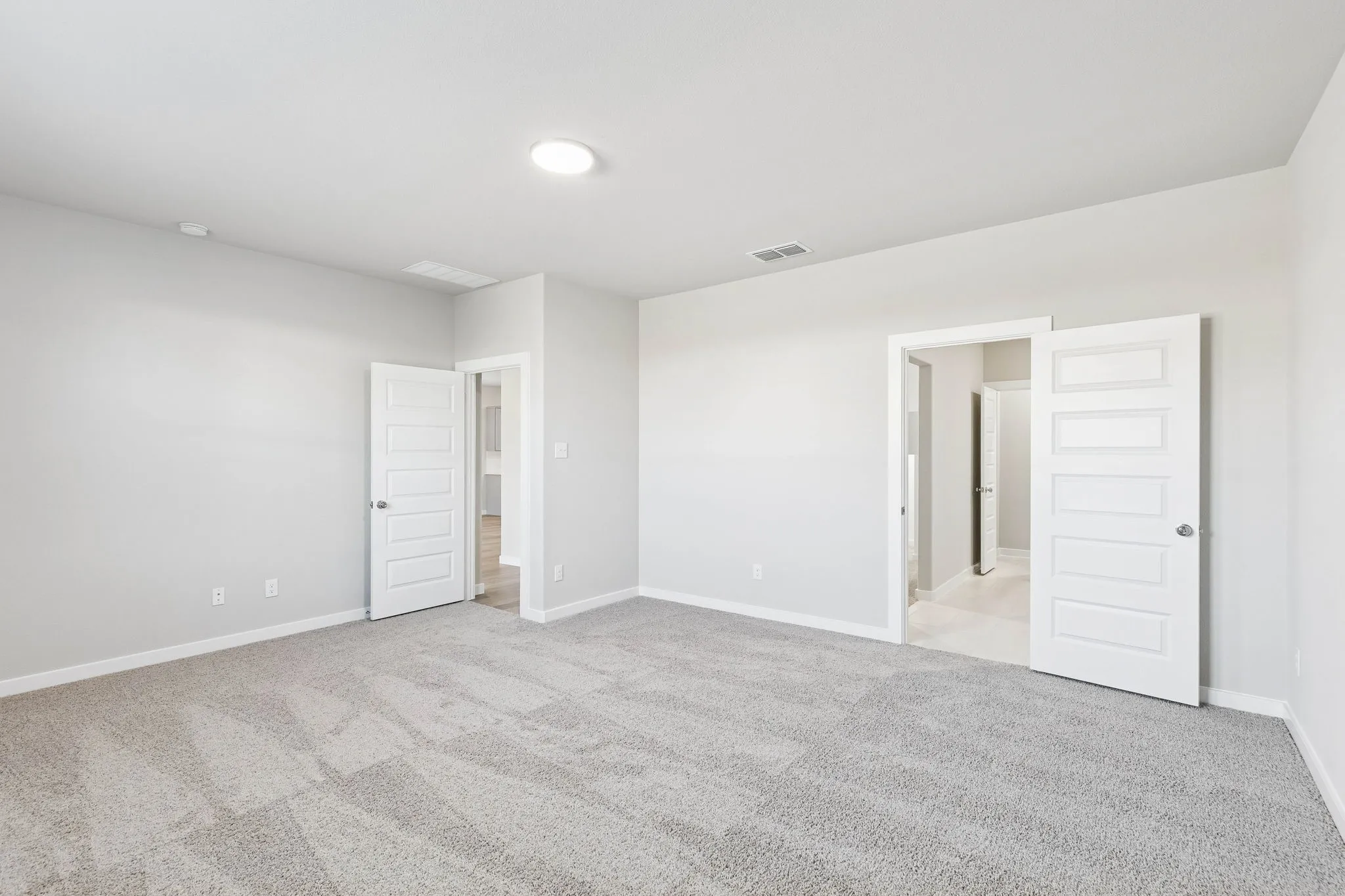Primary Suite in the Haylee home plan by Trophy Signature Homes - REPRESENTATIVE PHOTO