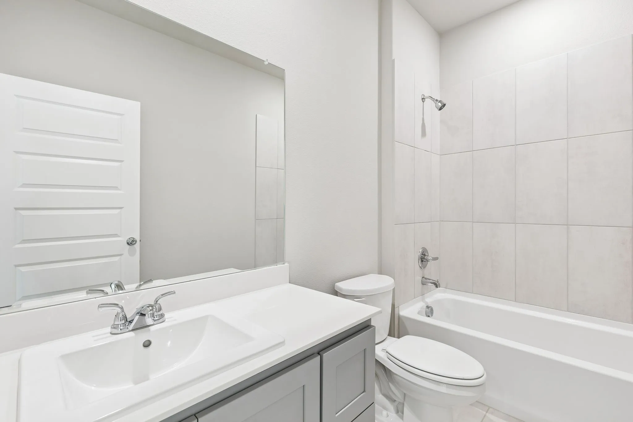 Bathroom in the Haylee home plan by Trophy Signature Homes - REPRESENTATIVE PHOTO