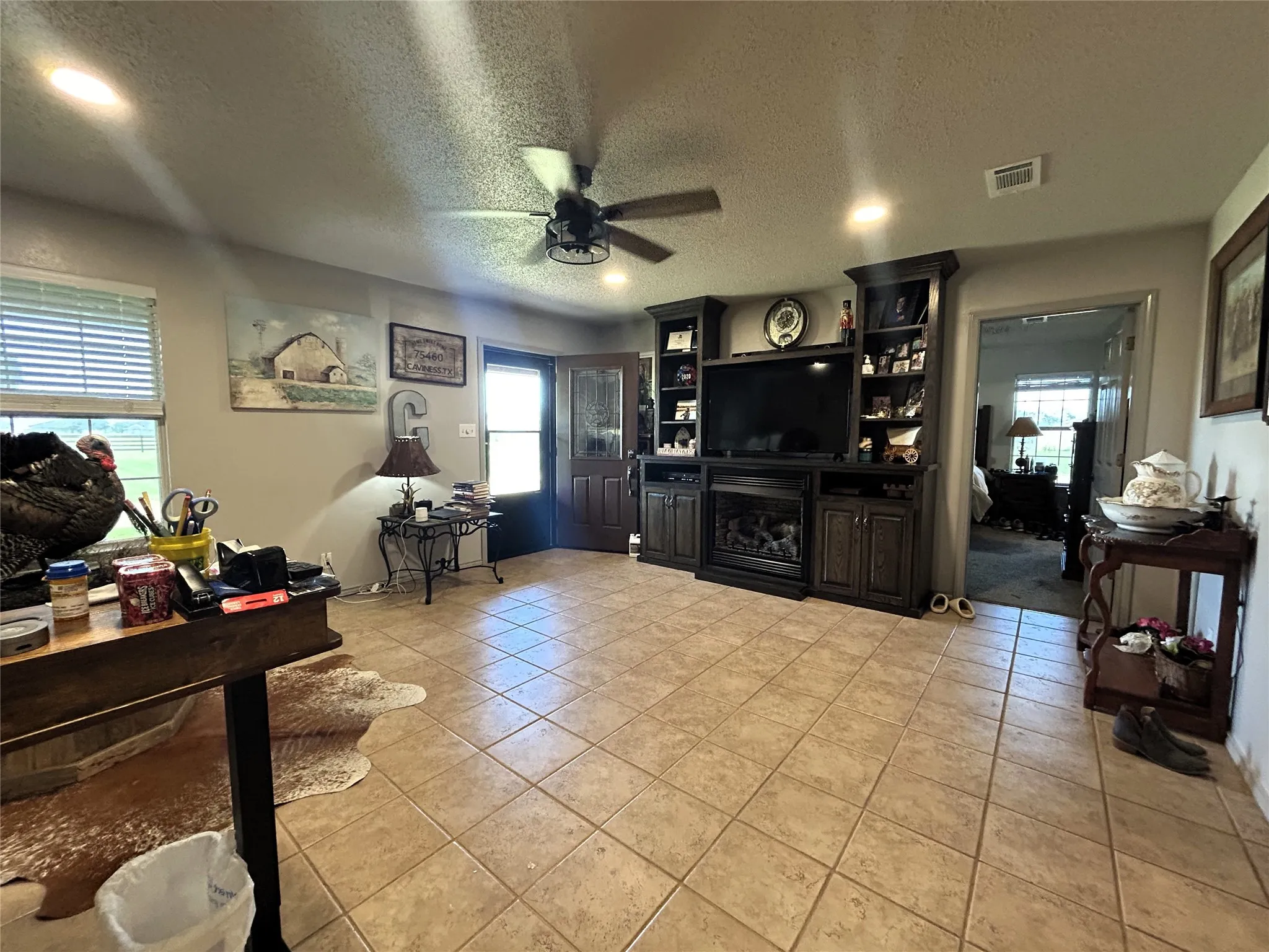 Front living room with lots of options for use.