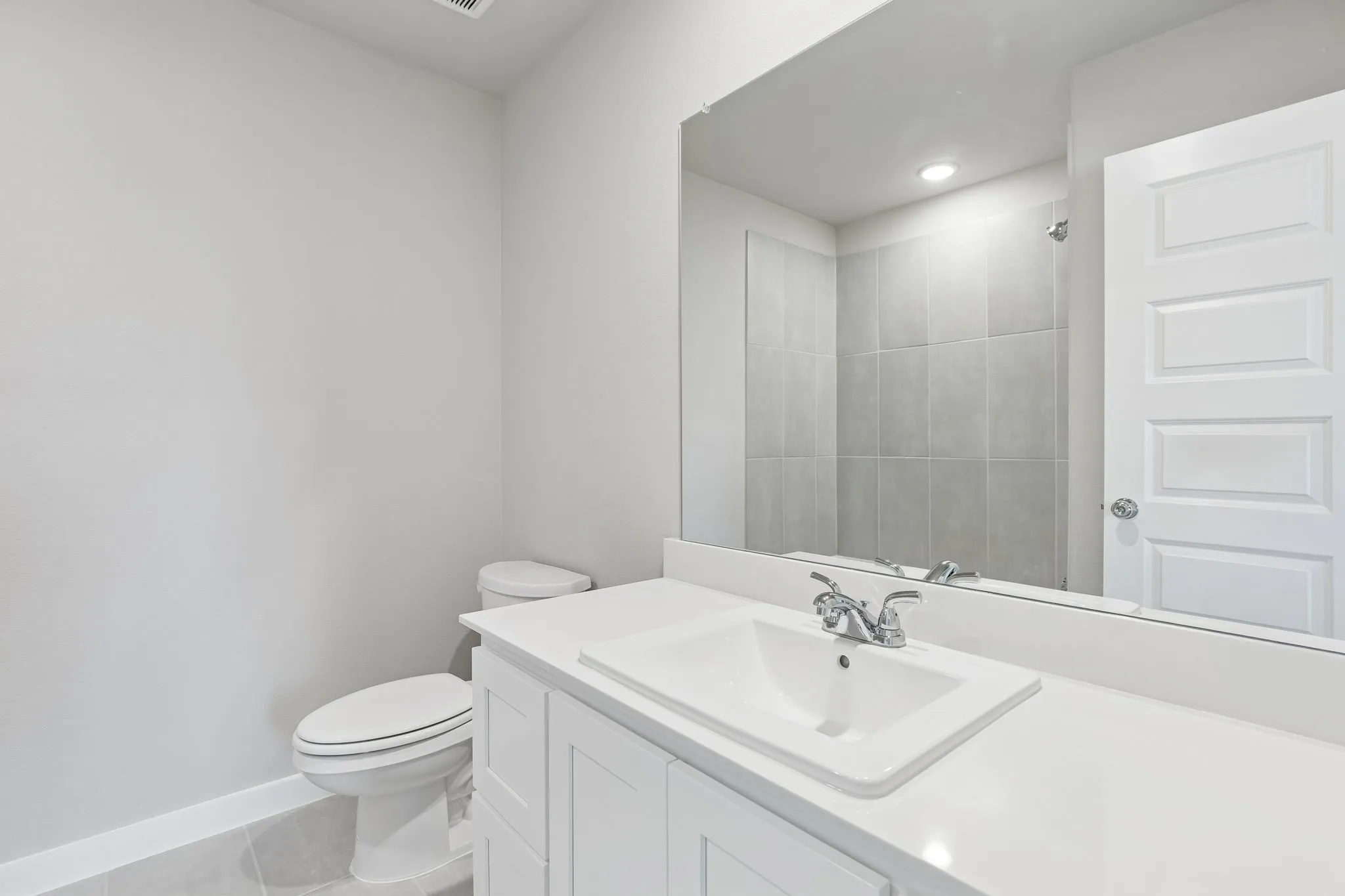 Bathroom in the Holden home plan by Trophy Signature Homes – REPRESENTATIVE PHOTO