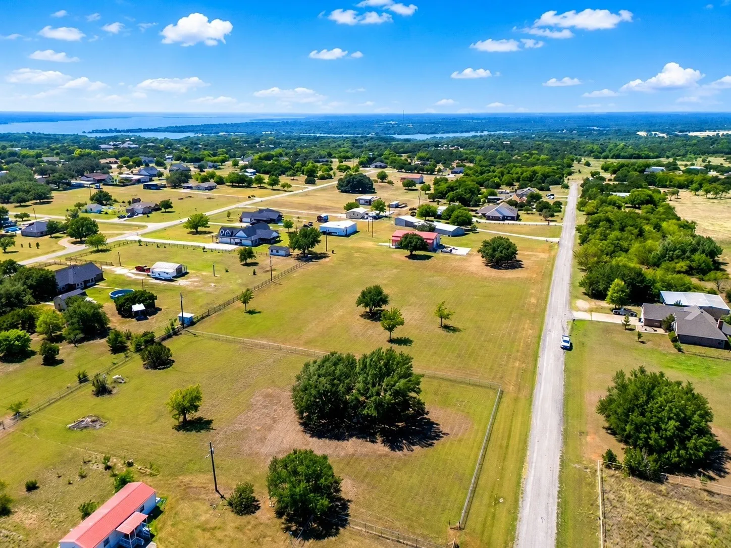 Expansive properties featuring mature trees and open green spaces