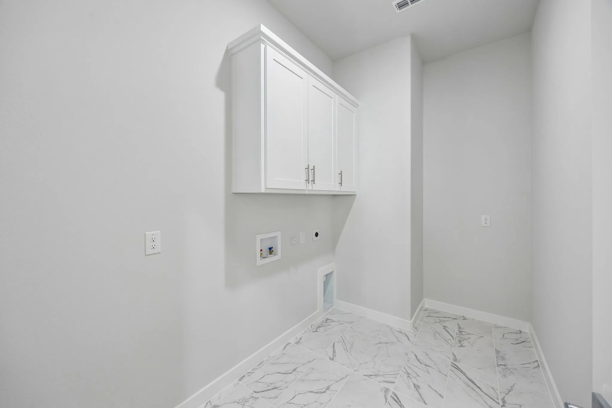 Utility Room in the Picasso II home plan by Trophy Signature Homes – REPRESENTATIVE PHOTO