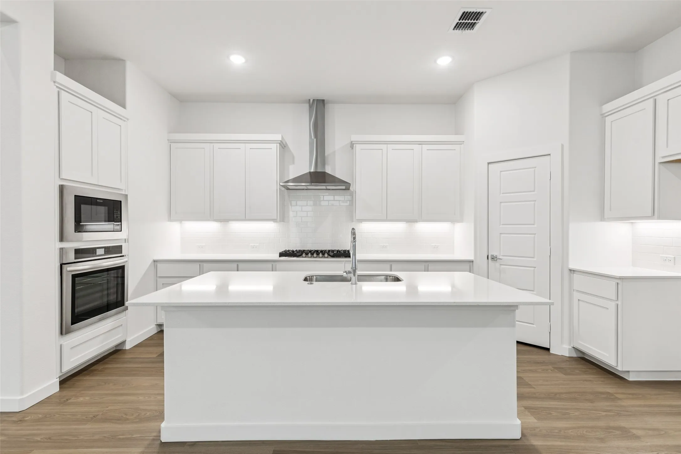 Kitchen in the Picasso II home plan by Trophy Signature Homes – REPRESENTATIVE PHOTO