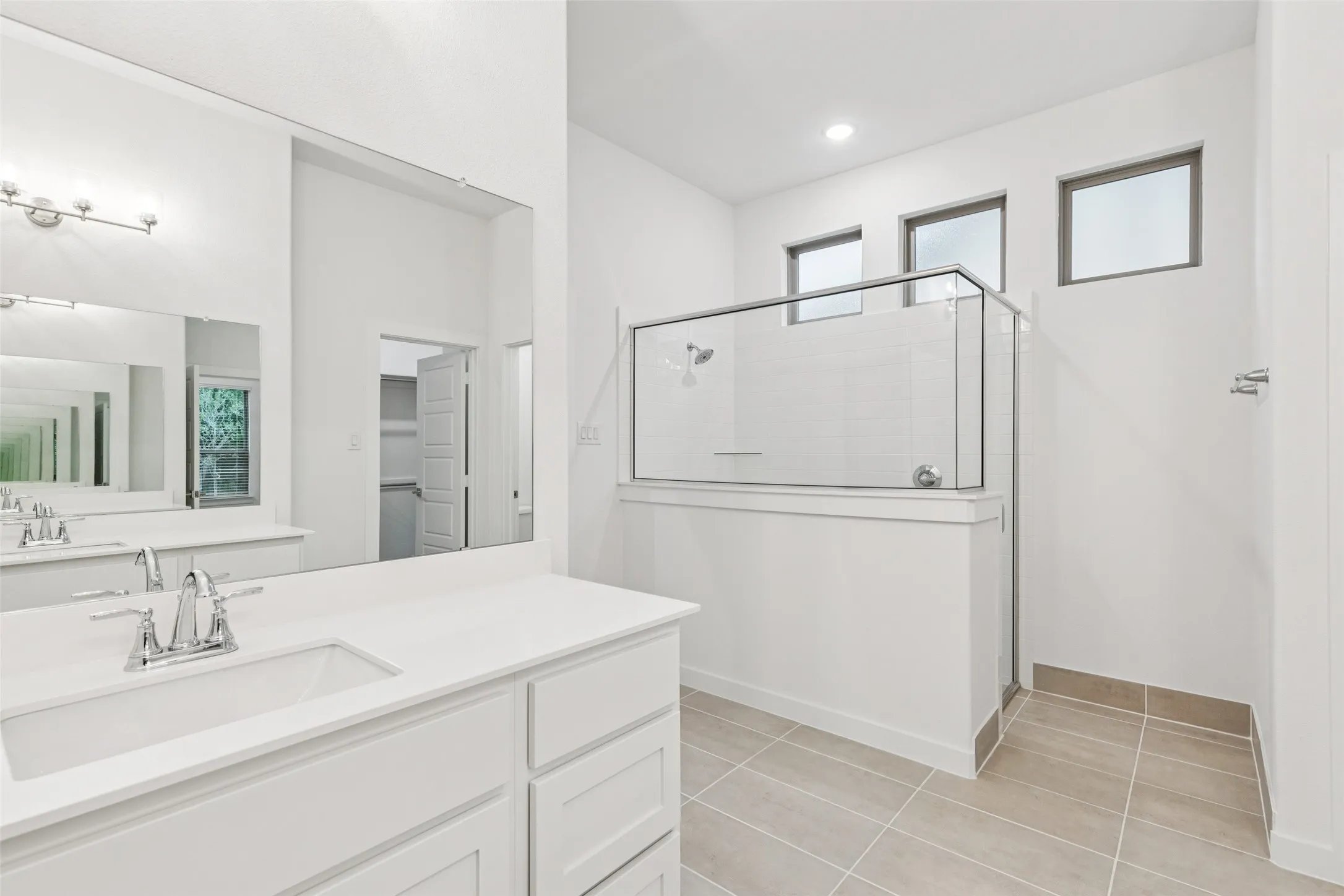 Primary Bathroom in the Picasso II home plan by Trophy Signature Homes – REPRESENTATIVE PHOTO