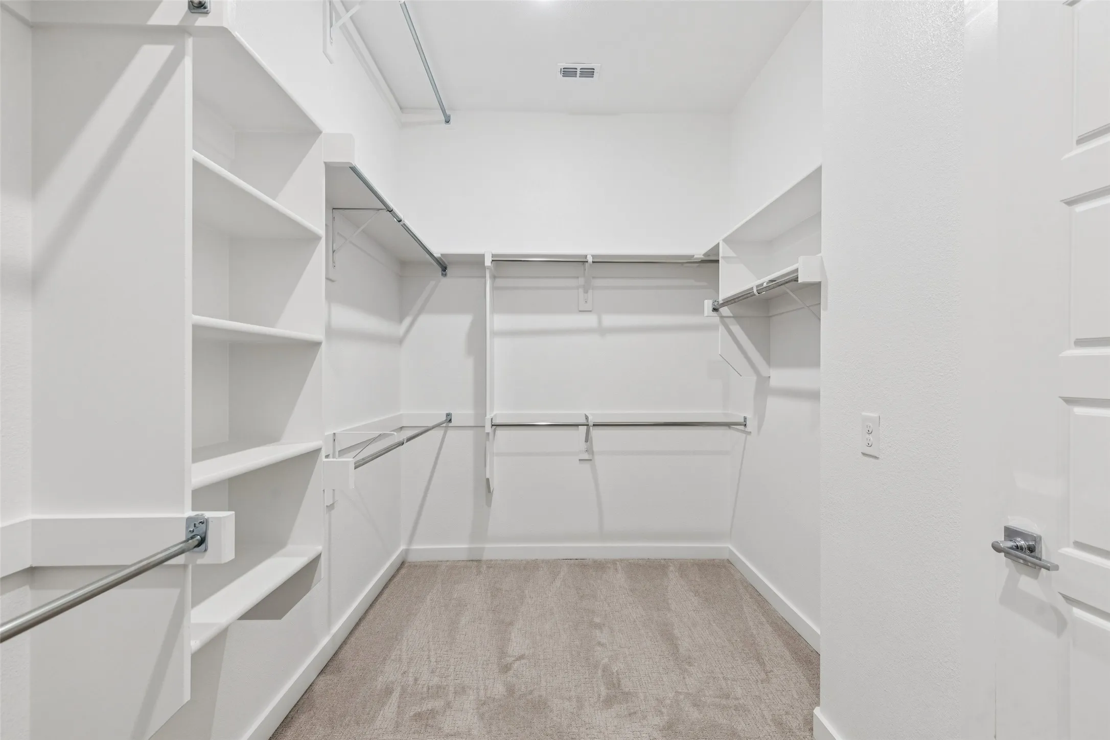 Primary Closet in the Picasso II home plan by Trophy Signature Homes – REPRESENTATIVE PHOTO