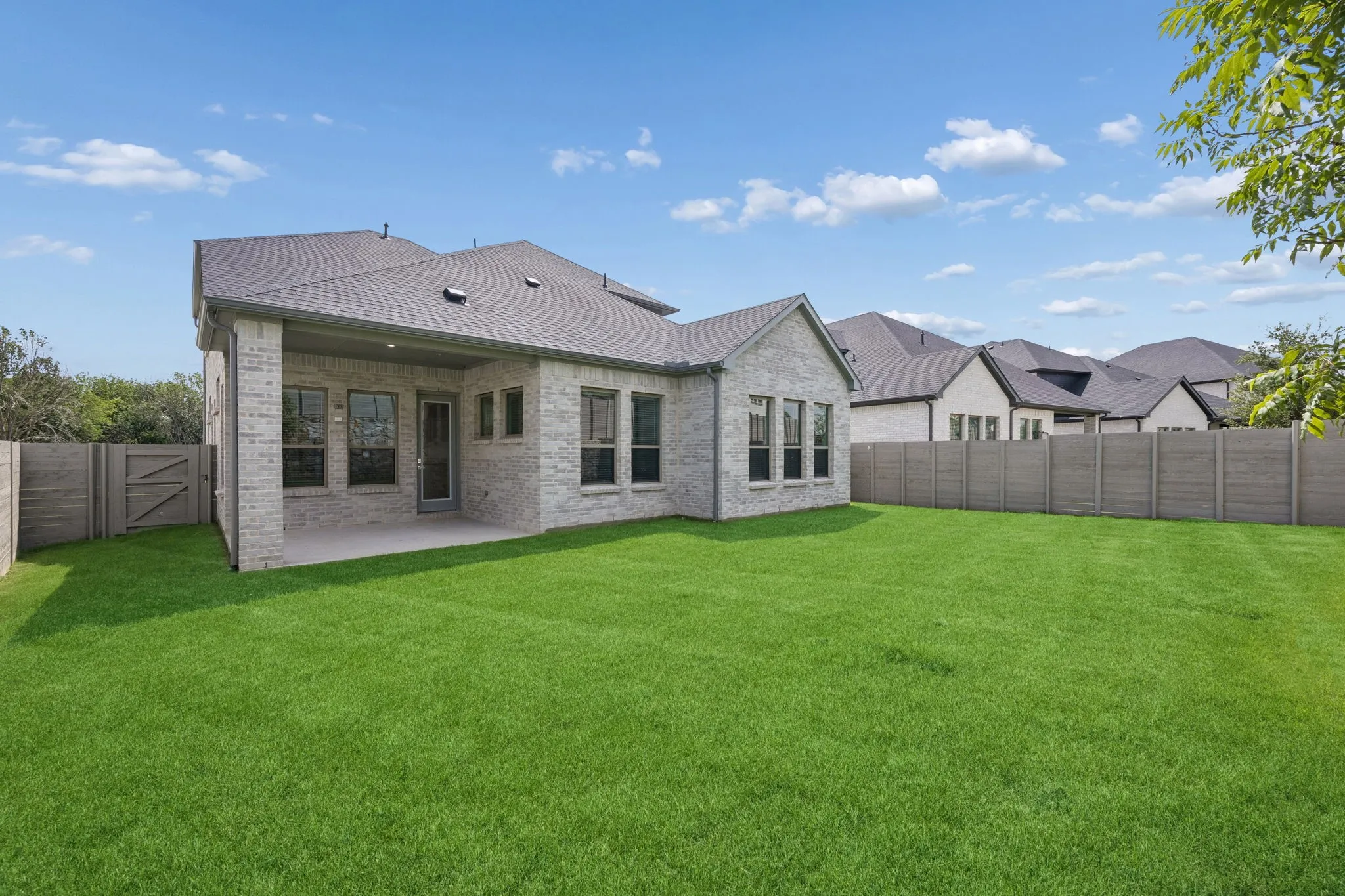 Covered Patio in the Picasso II home plan by Trophy Signature Homes – REPRESENTATIVE PHOTO
