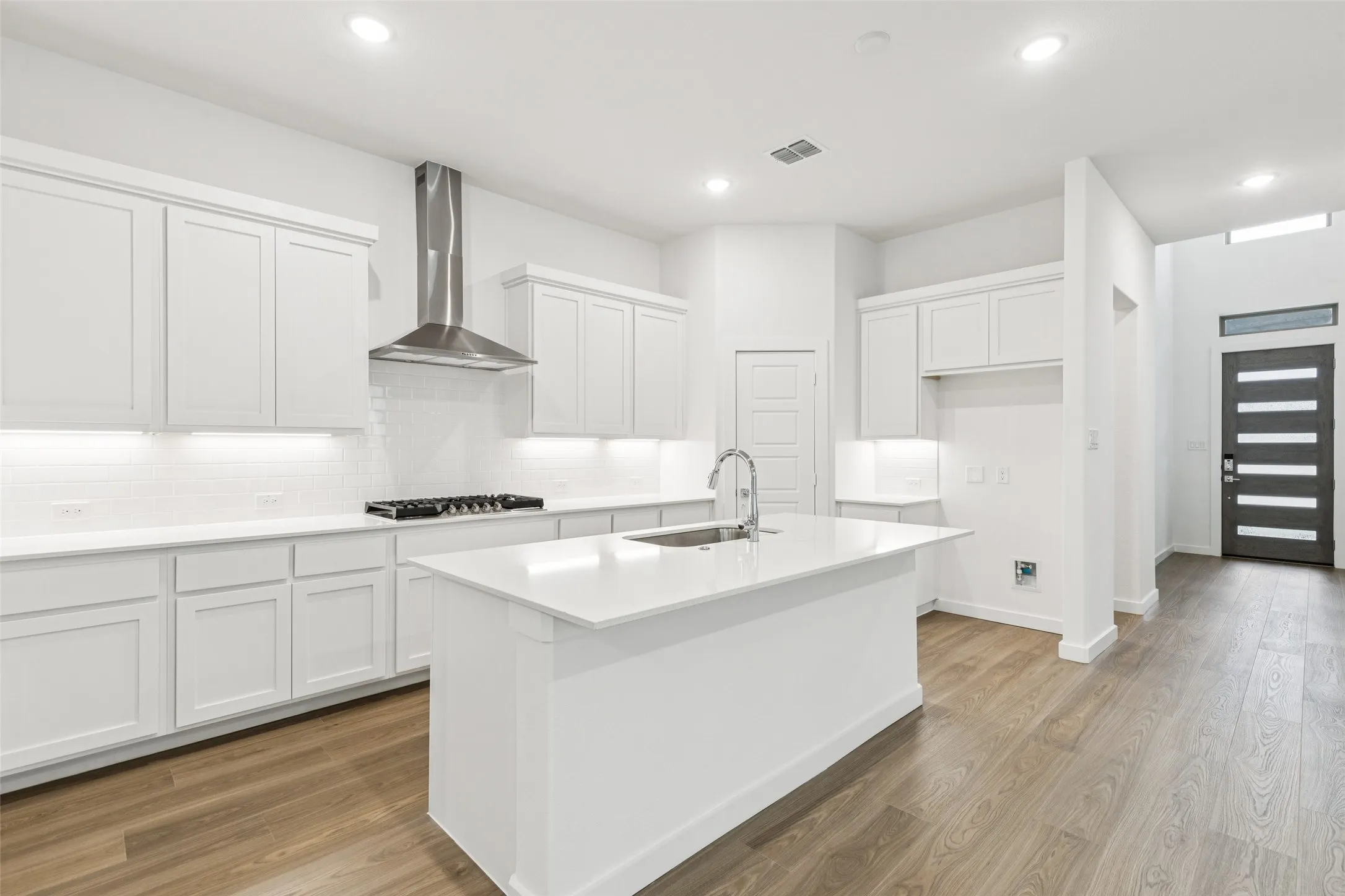 Kitchen in the Picasso II home plan by Trophy Signature Homes – REPRESENTATIVE PHOTO