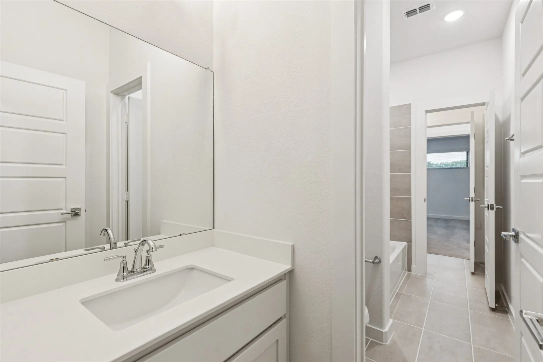 Bathroom in the Picasso II home plan by Trophy Signature Homes – REPRESENTATIVE PHOTO