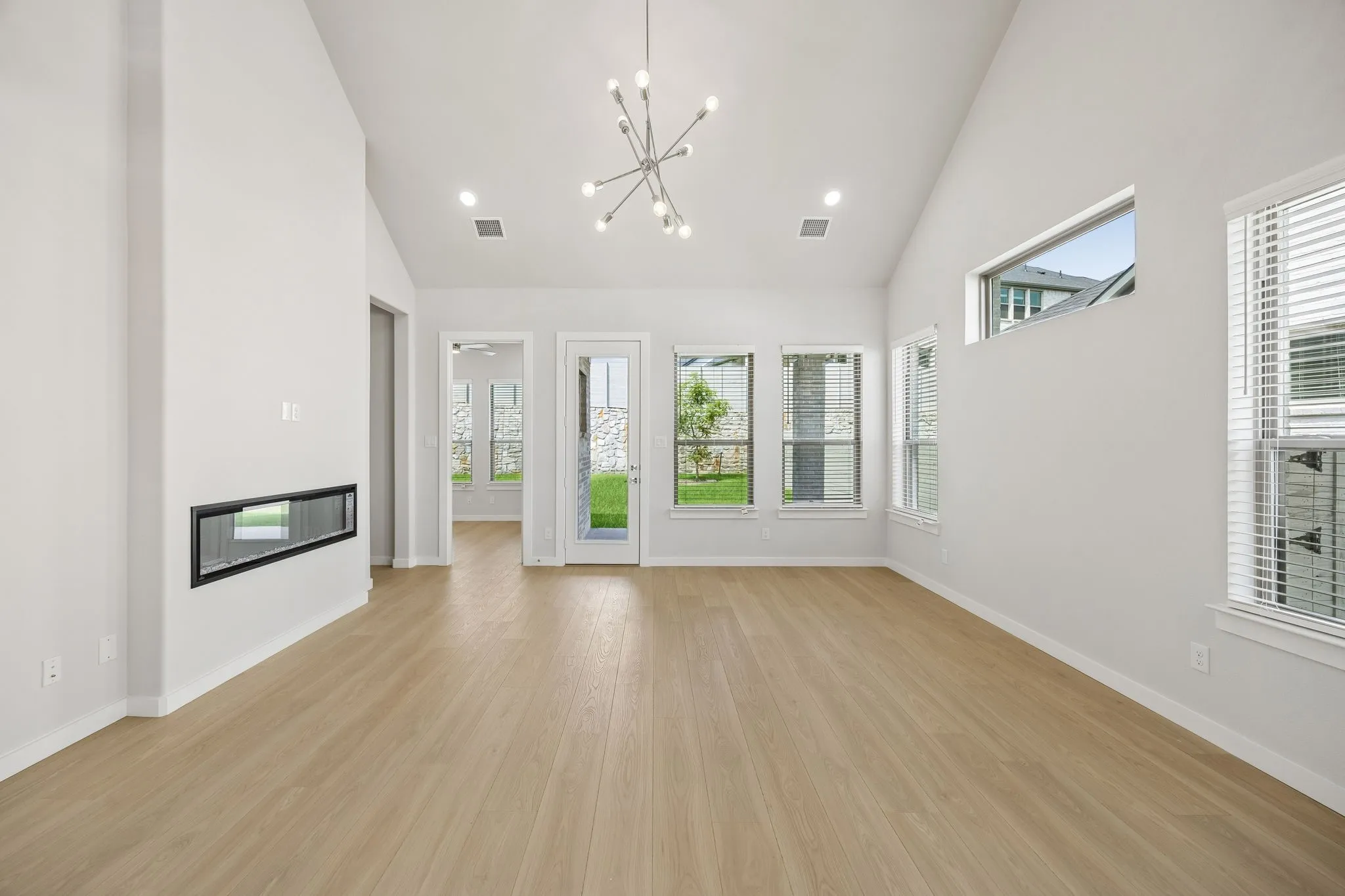 Living Room in the Picasso II home plan by Trophy Signature Homes – REPRESENTATIVE PHOTO