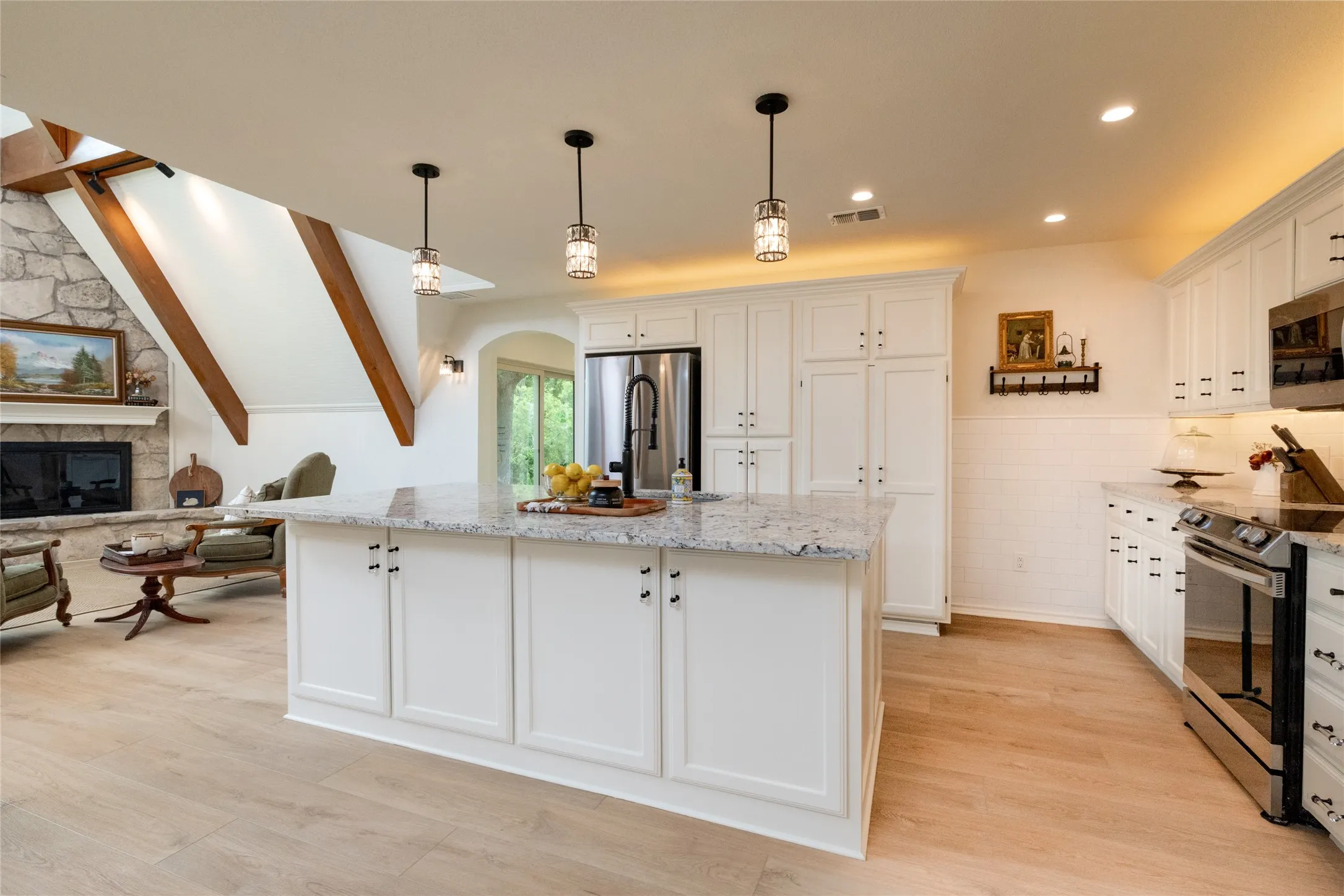 Stainless steel appliance package, Breakfast Bar Island, Coffee Bar and plenty of space to gather and create.  Forgot olive oil?  The market is only a few minutes away.