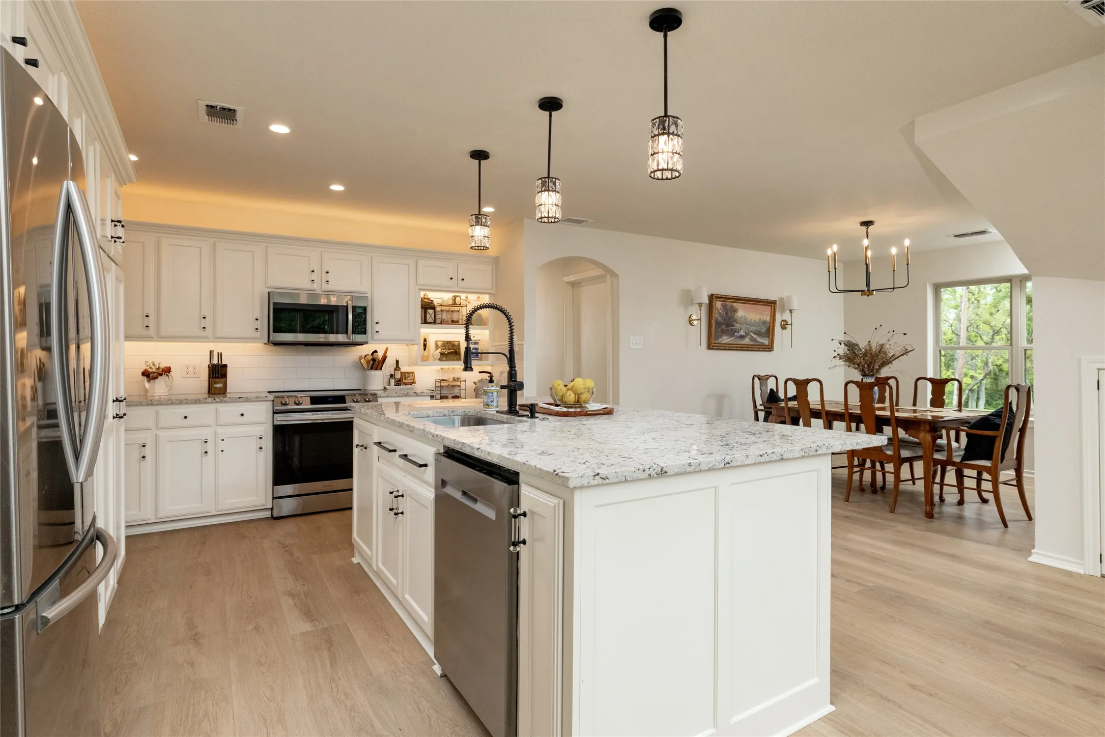 The Kitchen features a custom pantry with enhanced storage and the oven is fully loaded as an air fryer, convection, dehydrator and proof setting for baking.