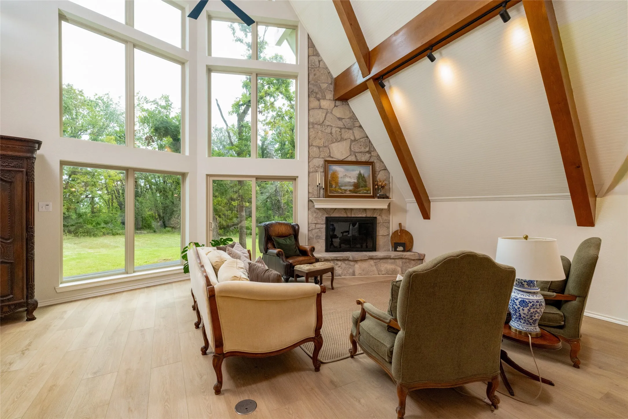 2-story living room with red oak beams, stone fireplace and a spectacular view of wildlife all year round.